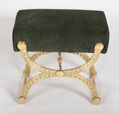 Brass and Suede Curule Form Neoclassical Style Stool with Vitruvian Wave Motif