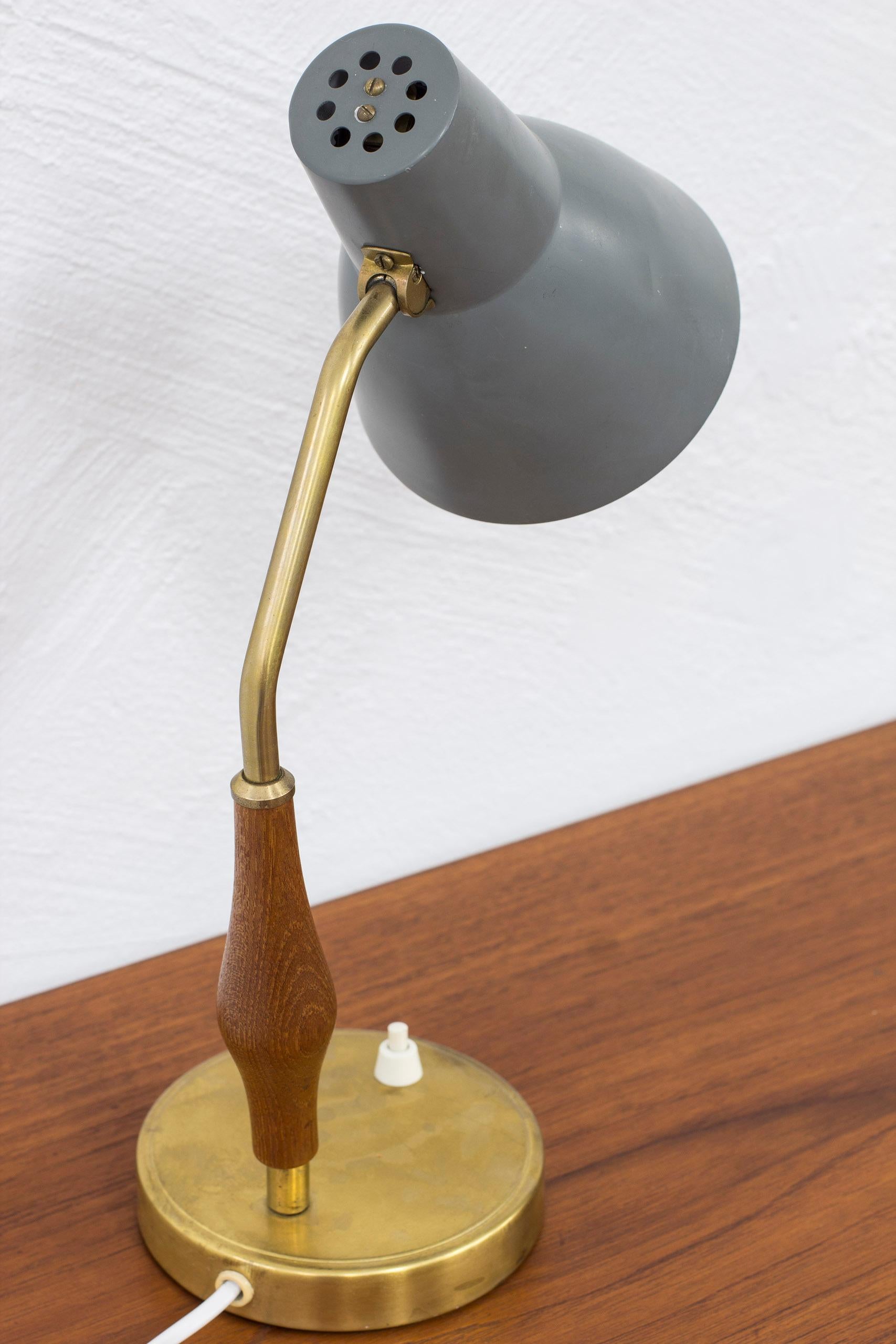 Scandinavian Modern Brass and Teak Table Lamp by ASEA, Sweden, 1950s For Sale