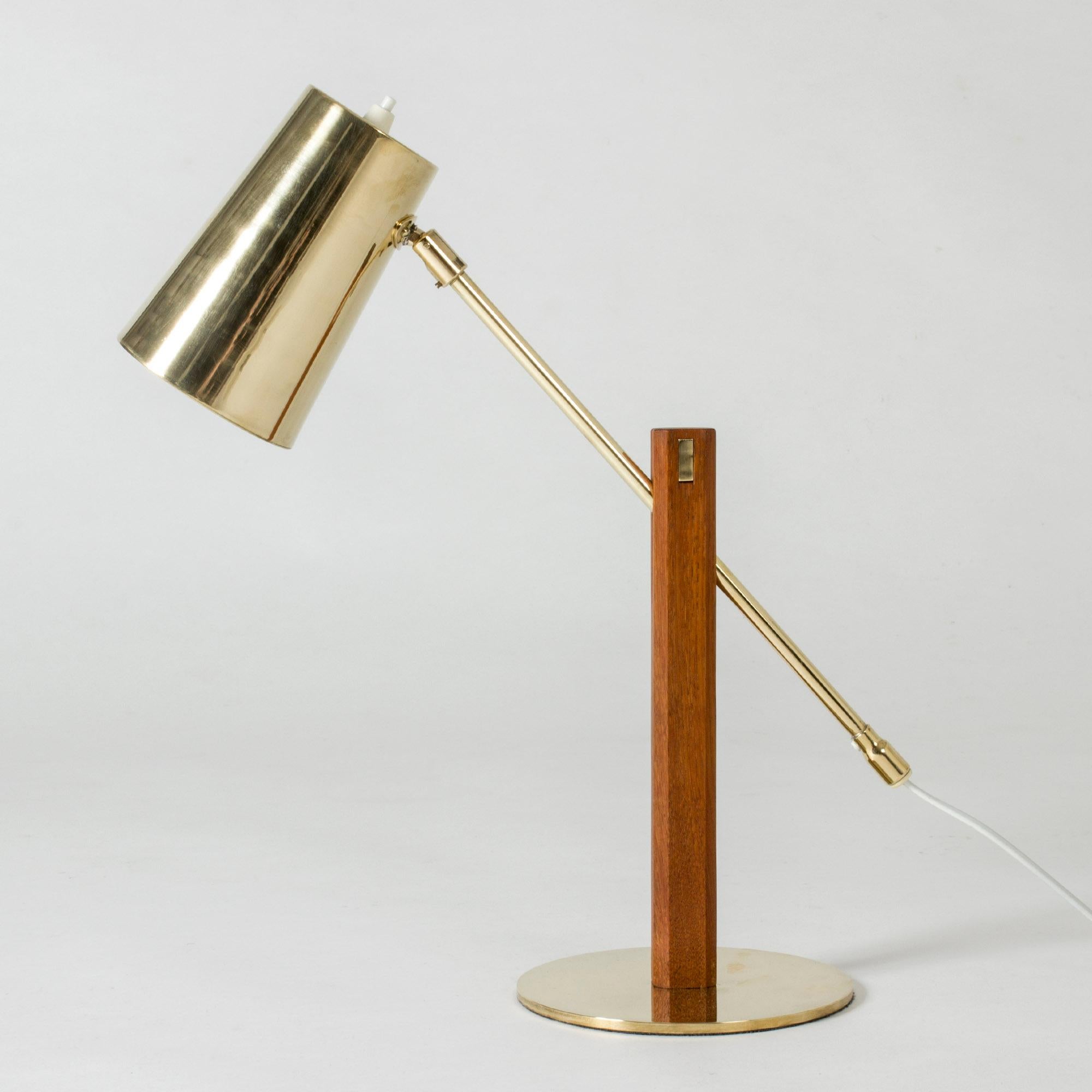 Brass table lamp with a teak handle by Hans Bergström. Adjustable angle of the lamp shade, amazing details.