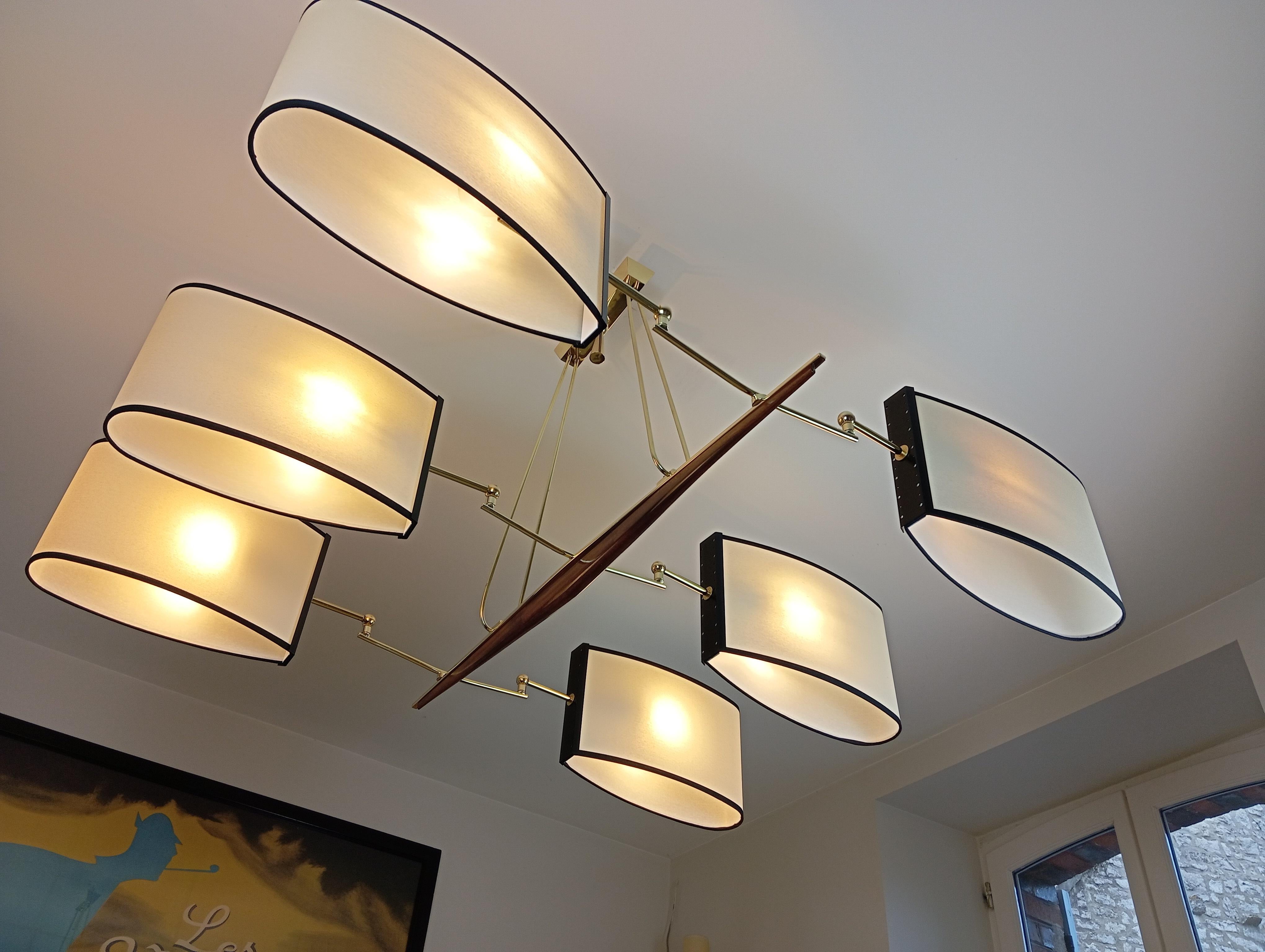 Brass and teak wood 6-arm chandelier Maison Lunel circa 1960 For Sale 8