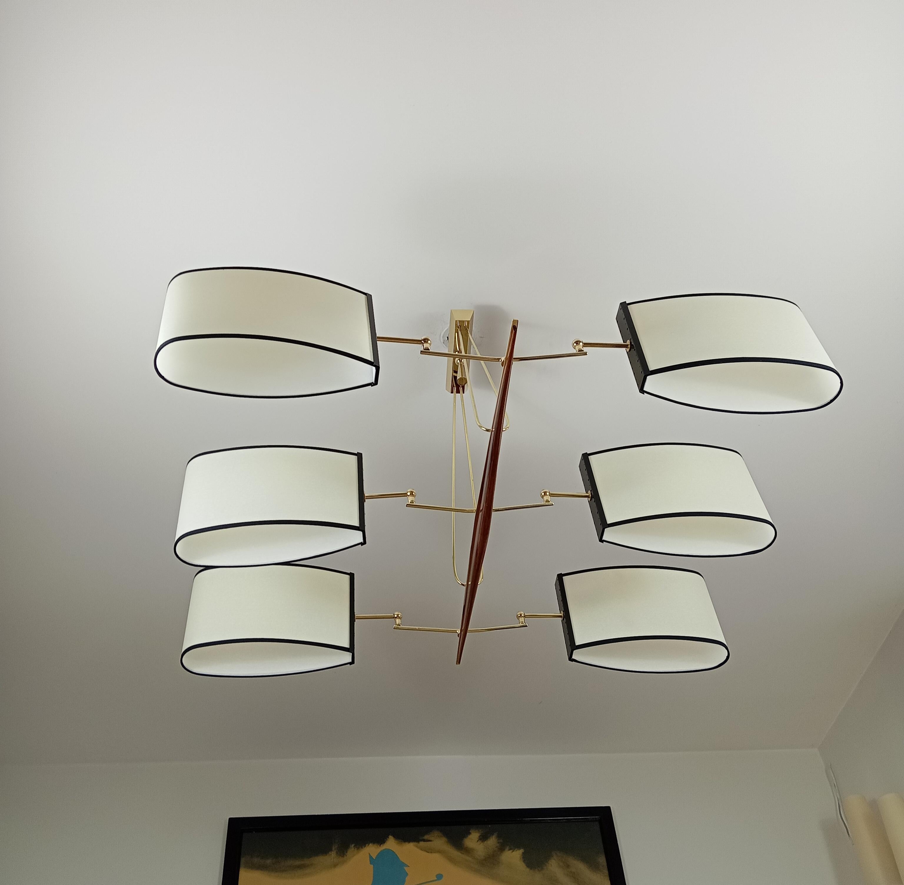 Brass and teak wood 6-arm chandelier Maison Lunel circa 1960 In Excellent Condition For Sale In Saint-Ouen, FR