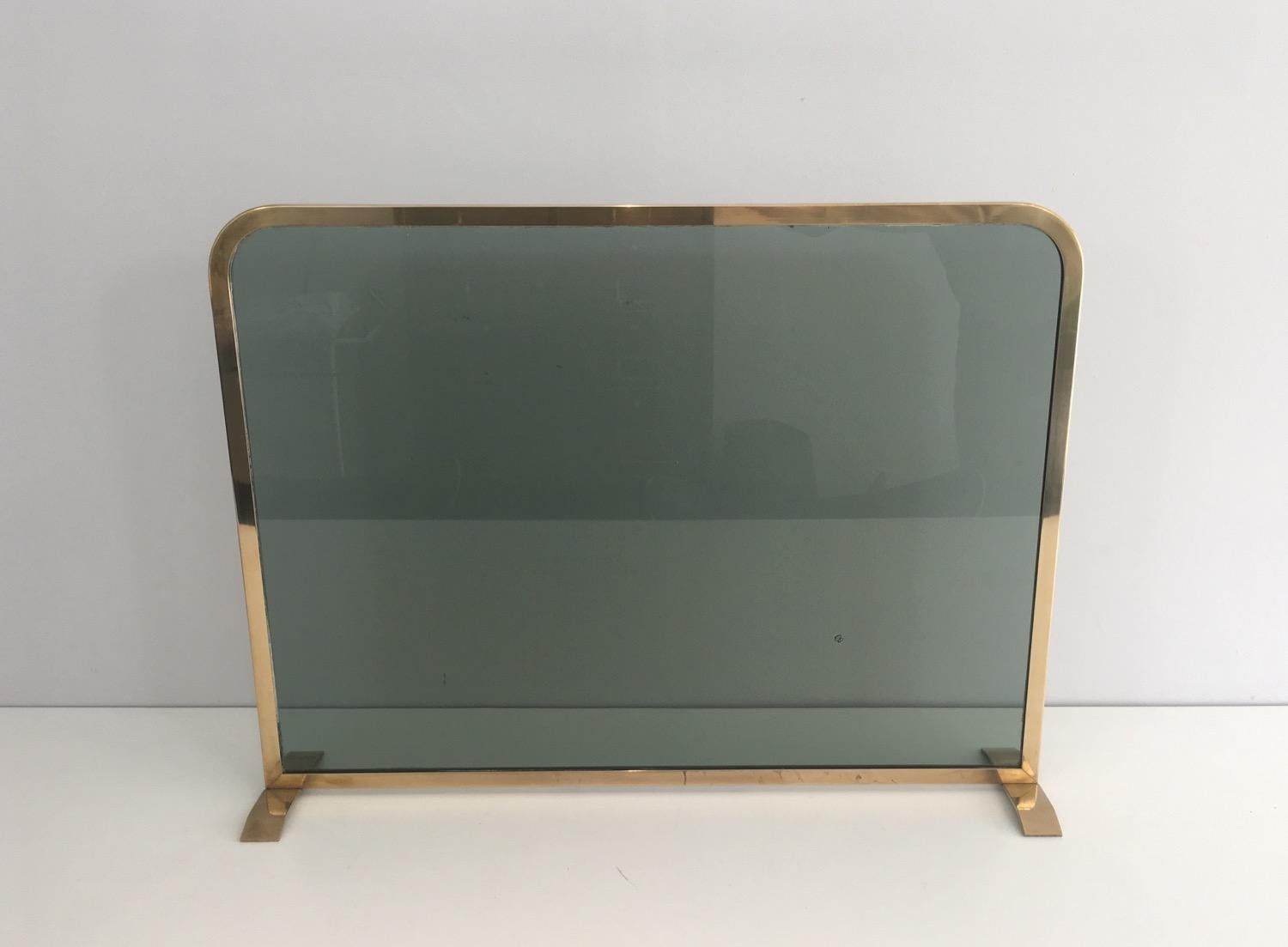 Brass and tempered glass fire place screen, circa 1970.