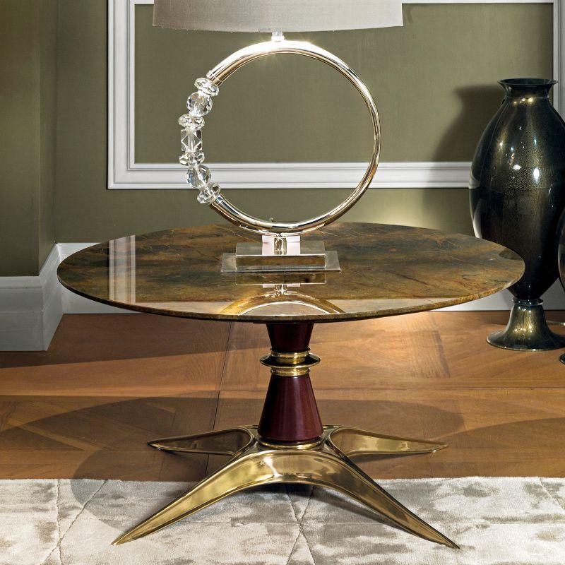This stupendous round side table will exquisitely match one of the sofas from Provasi's collections, thanks to a timeless and versatile style of refined sophistication. Resting on a brass base, it features a Terra di Siena marble top.