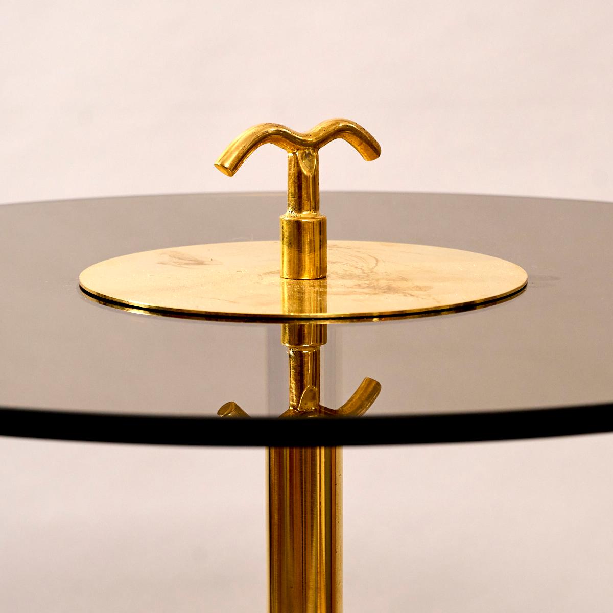 Mid-Century Modern Brass and tinted glass tripod side table For Sale