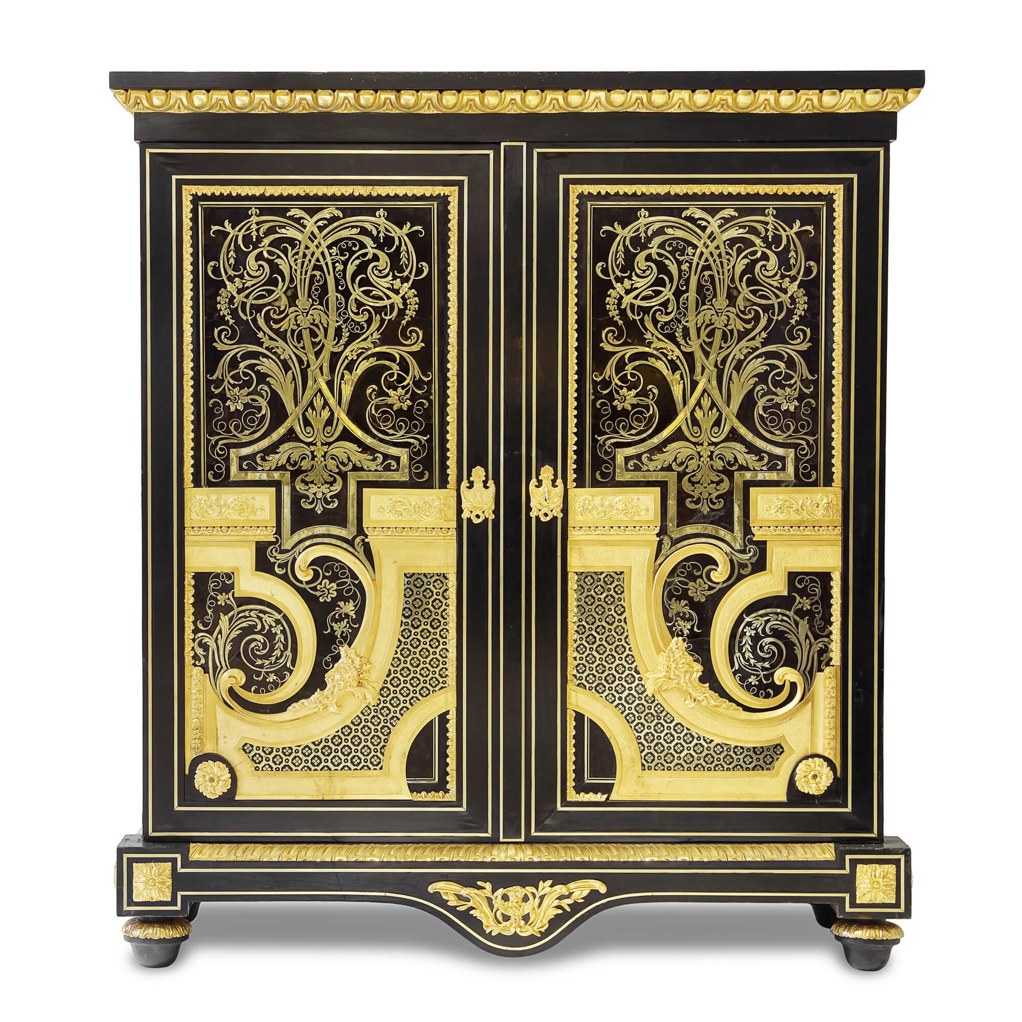 Brass and tortoiseshell inlaid Boulle style ebonised wood cabinets
French, late 19th Century
Height 142cm, width 127.5cm, depth 49.5cm

The magnificent cabinets in this pair are crafted in the style of André-Charles Boulle, an ébéniste who