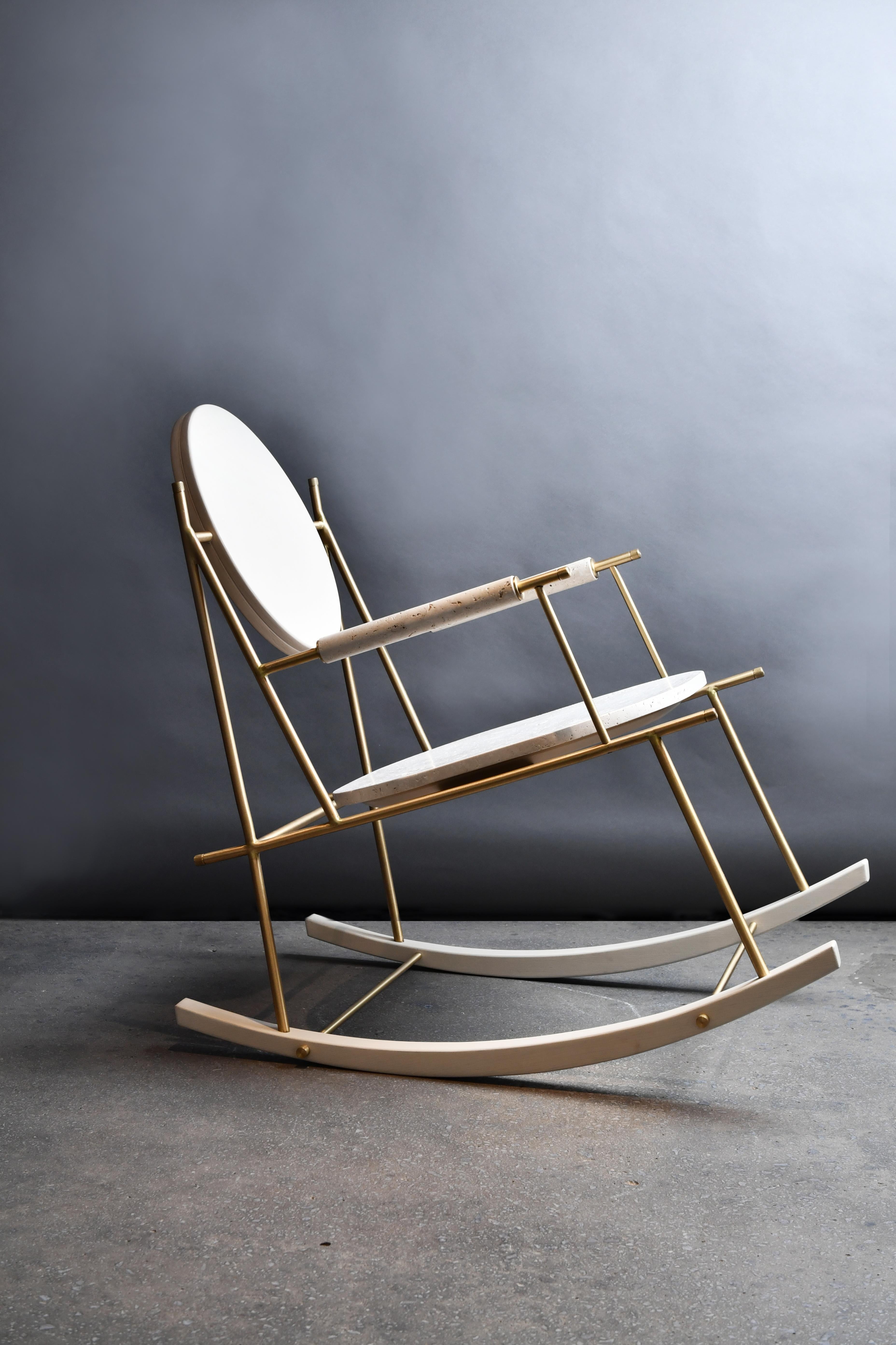 Travertino nostalgia rocking chair by Saccal Design House
Dimensions: L 51 x D 93 x H 88 cm
Materials: Travertino navona, oakwood, brass 

Saccal Design House, located in Beirut Lebanon, was founded in 2014 by two sisters Nour and Maysa