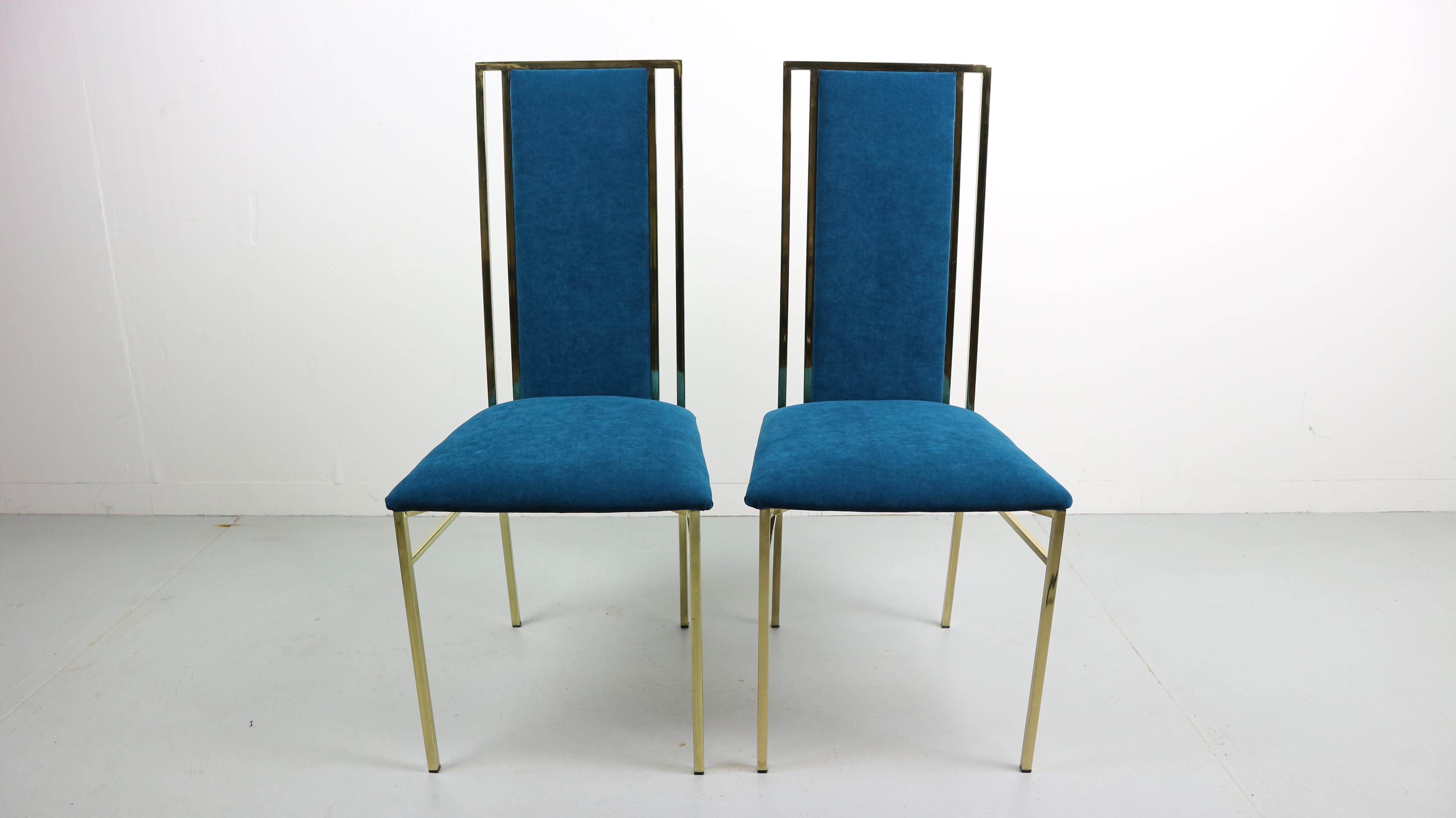 These Italian polished brass framed dining chairs attributed to Romeo Rega.
The mixed metal framing adds a modern note to the chairs' appearance.
The chairs has been newly upholstered in Azure color velvet.
 