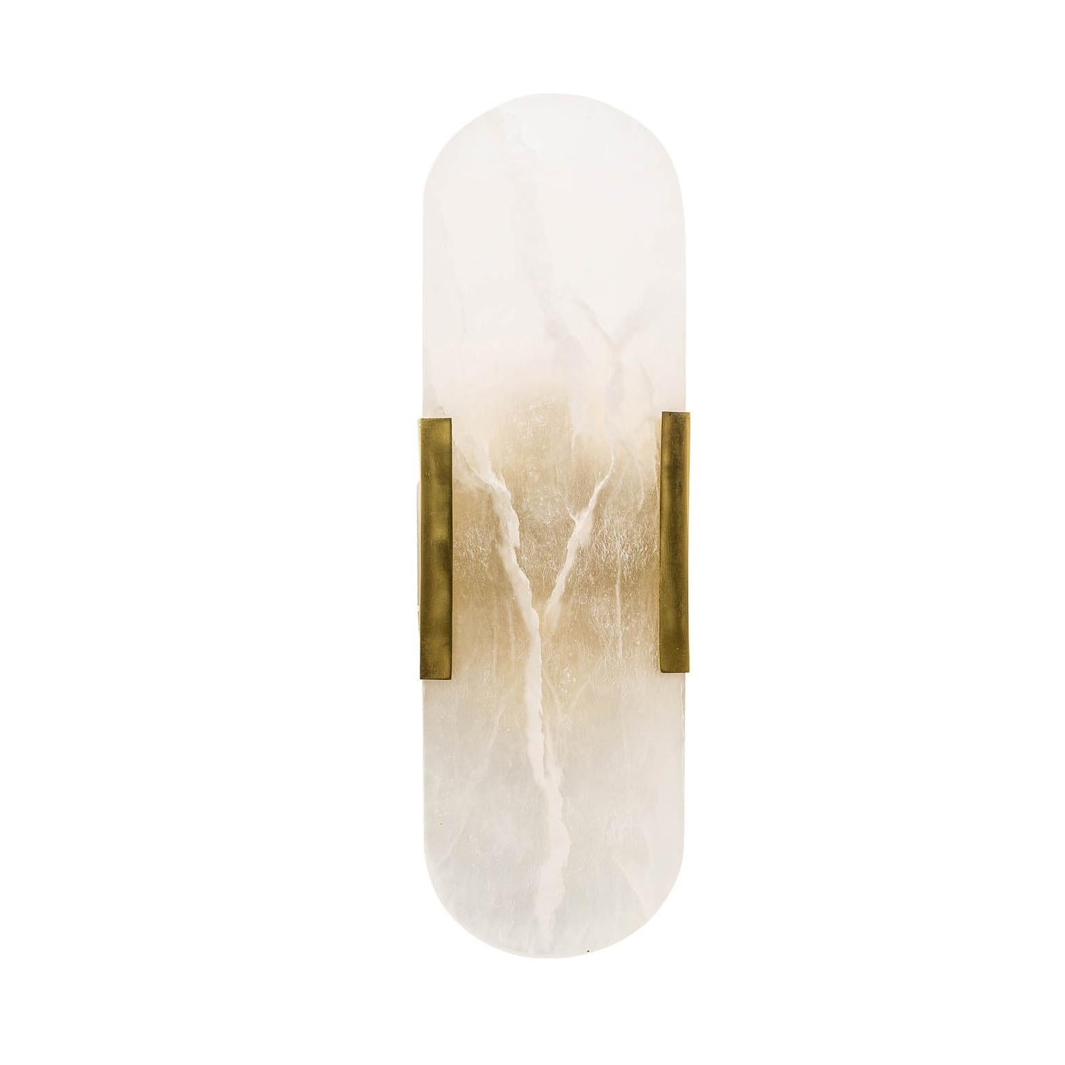 Brass and white Alabaster wall light, elegant, presence and class all in transparency. New item, never used.