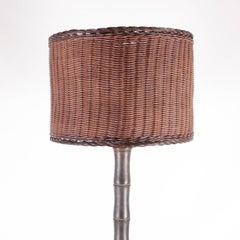 Brass and wicker floor lamp