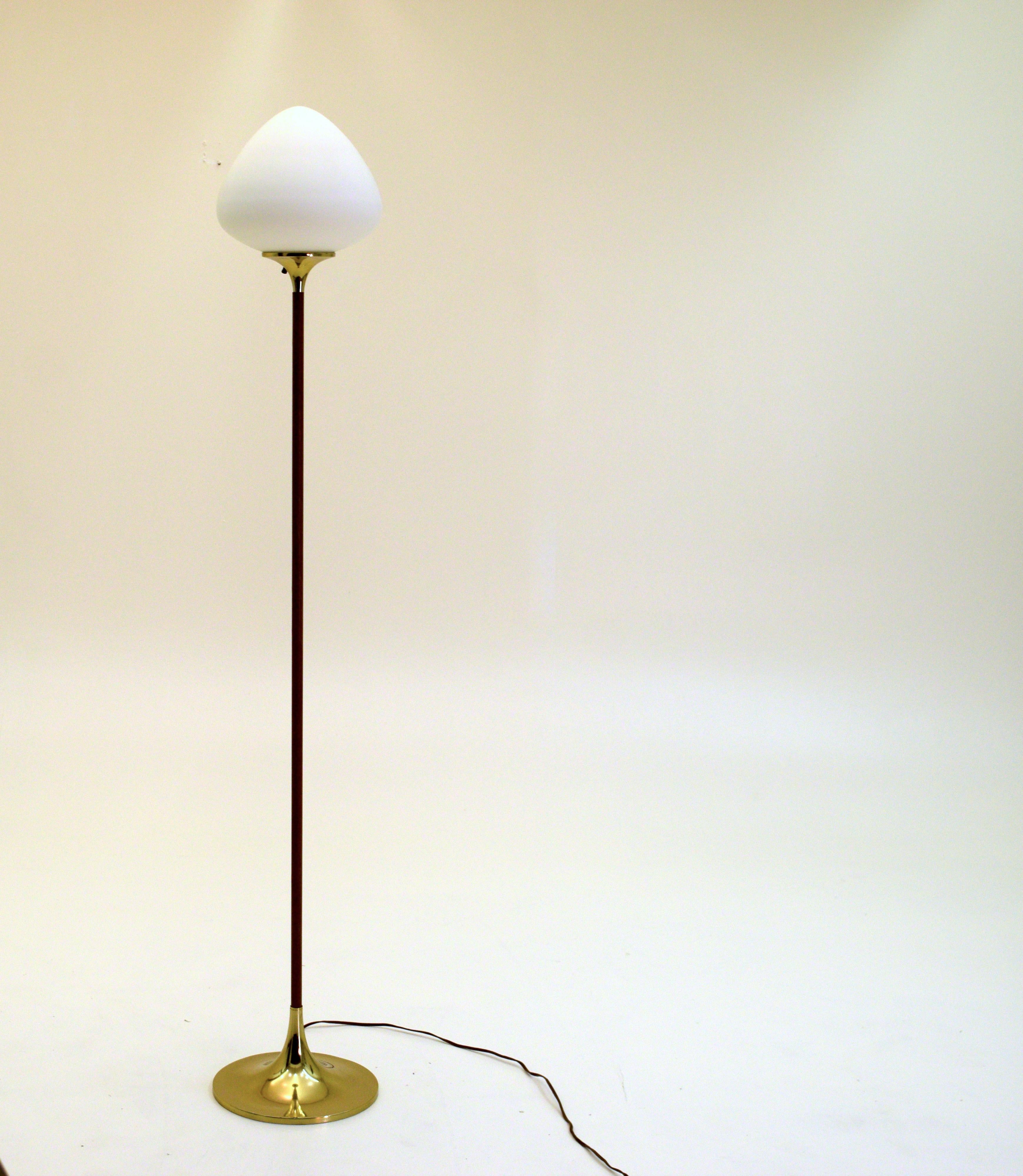 Laurel Lighting, circa 1959, USA
Bill Curry Design
Brass, walnut and opaline glass.
57 tall x 10 inches round. Glass shade 9 inches wide.

A minimalist floor lamp by the Laurel Lamp Manufacturing company. In excellent condition with a trumpet styled