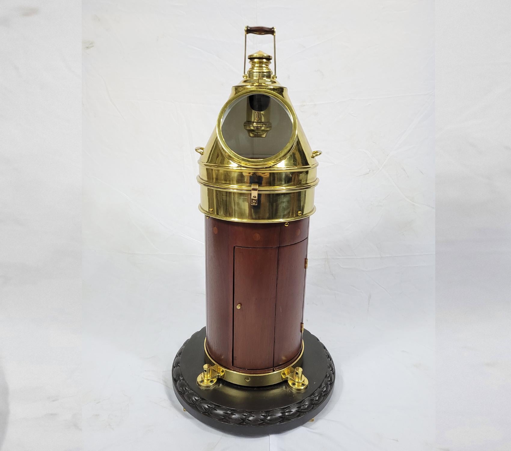 Outstanding boat binnacle. This has been meticulously polished and lacquered. The varnished base has a warm patina. The gimballed compass is engraved E.S. Ritchie and Sons, Boston with serial number 43413. Circa 1935

Made: America
Material: Wood