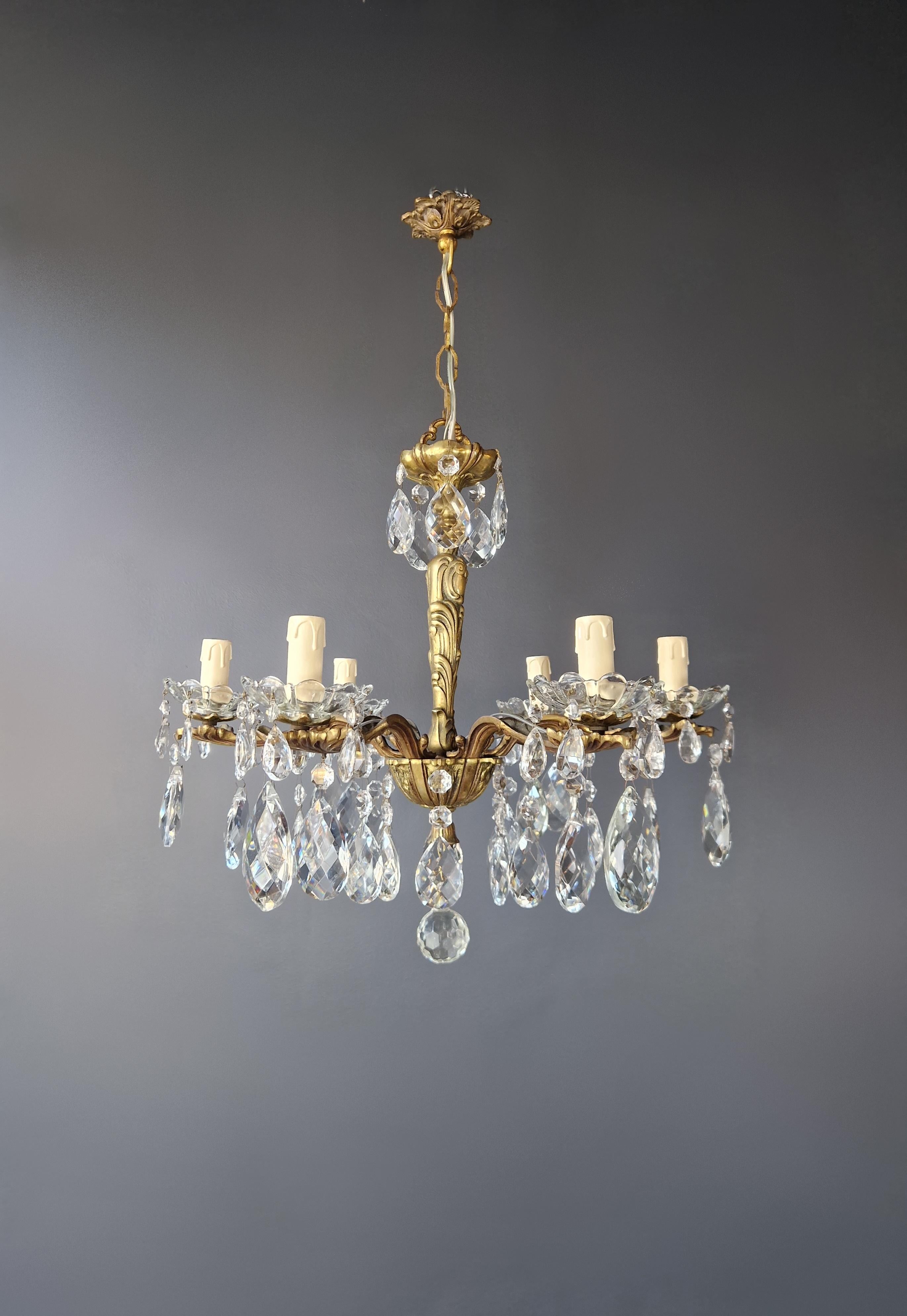 Introducing our beautifully restored old chandelier from Berlin! This exquisite piece has been professionally refurbished with love and expertise, and its electrical wiring is compatible with the US. It has been re-wired and is ready to be hung,