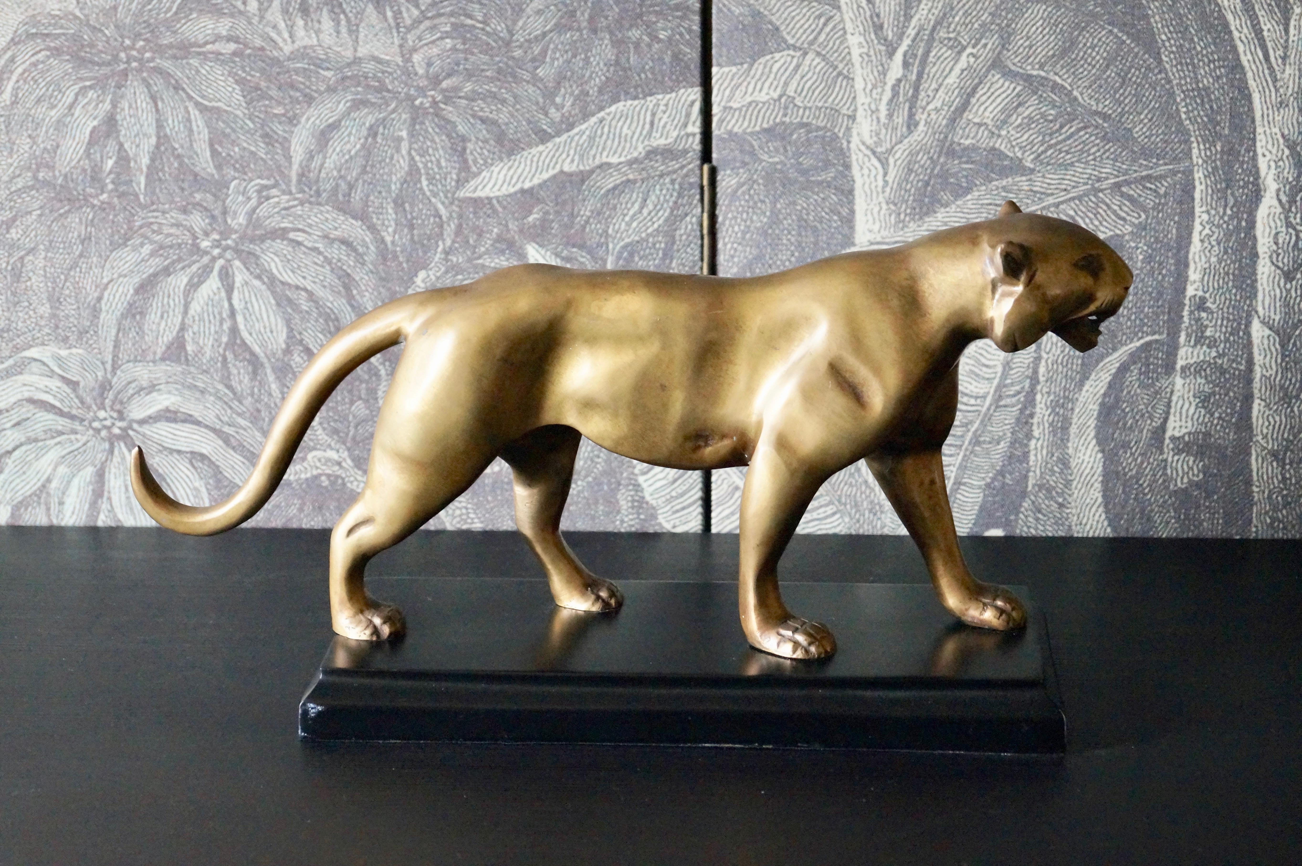 Wonderful brass sculpture of a lion. Abstracted with beautiful impression of the strong lion body.

France 1970s.