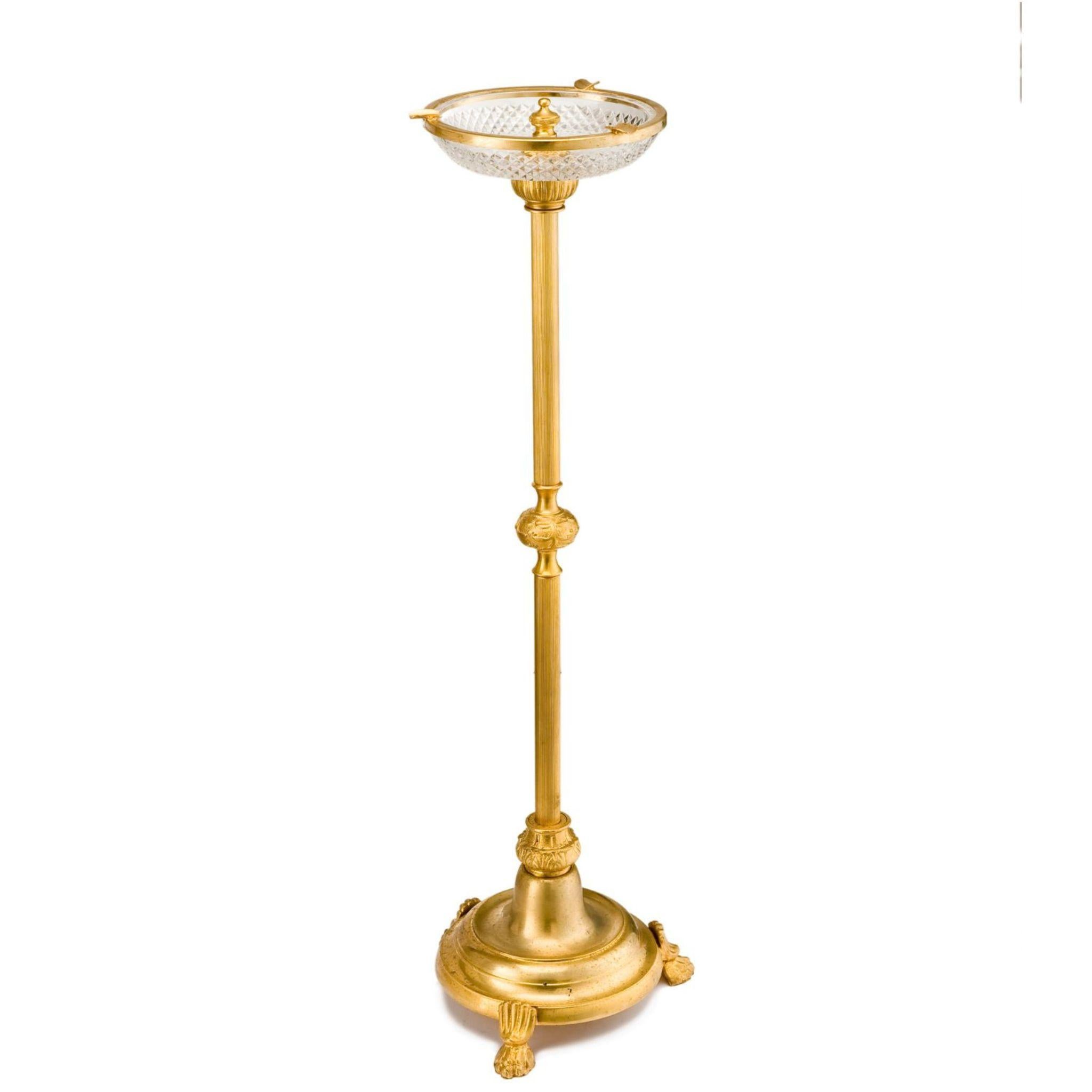 This brass floor ashtray is a perfect combination of style and function. With a sleek and modern design, it will fit perfectly into any decor, while its durable brass construction ensures it can withstand regular use. A must-have for any smoking