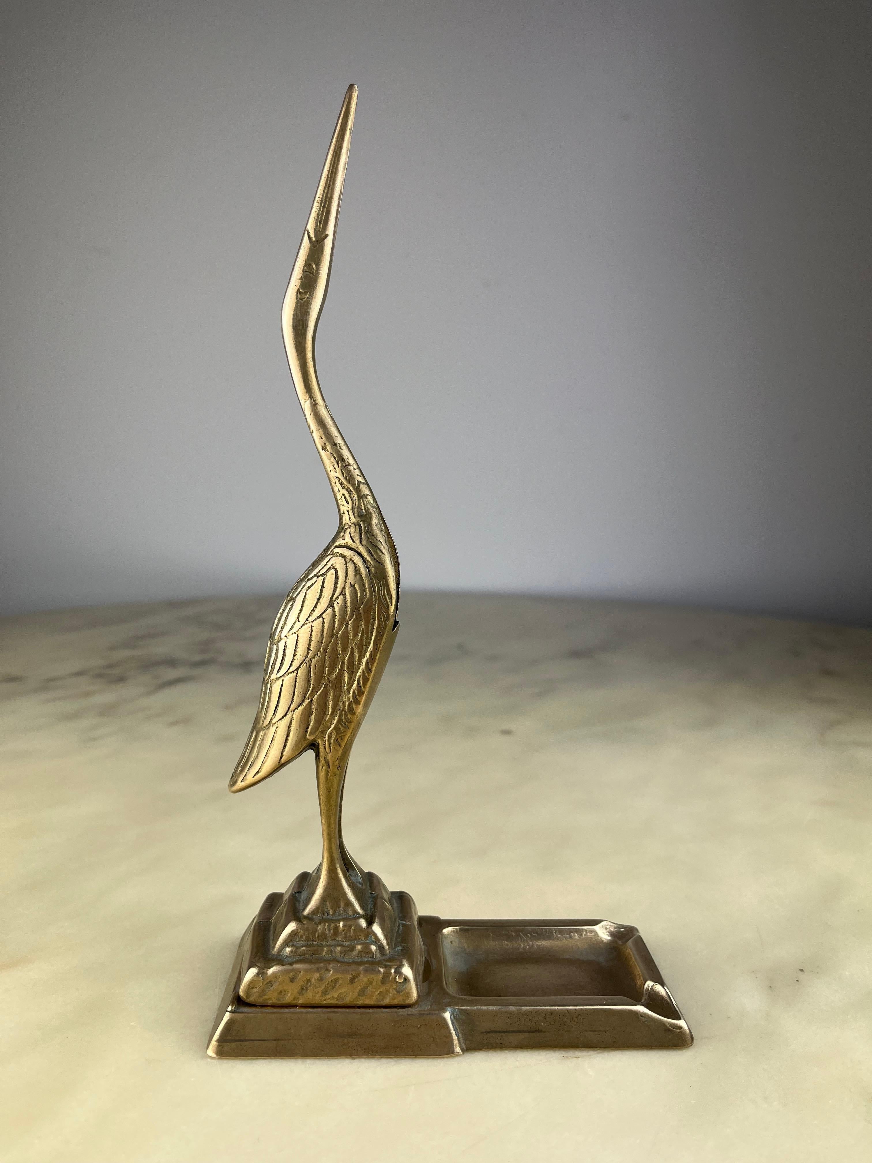 Mid-Century Flamingo Brass ashtray, made in  Italy, 1960s
Small signs of time and use.
Object of great charm.

We guarantee adequate packaging and will ship via DHL, insuring the contents against any breakage or loss of the package.