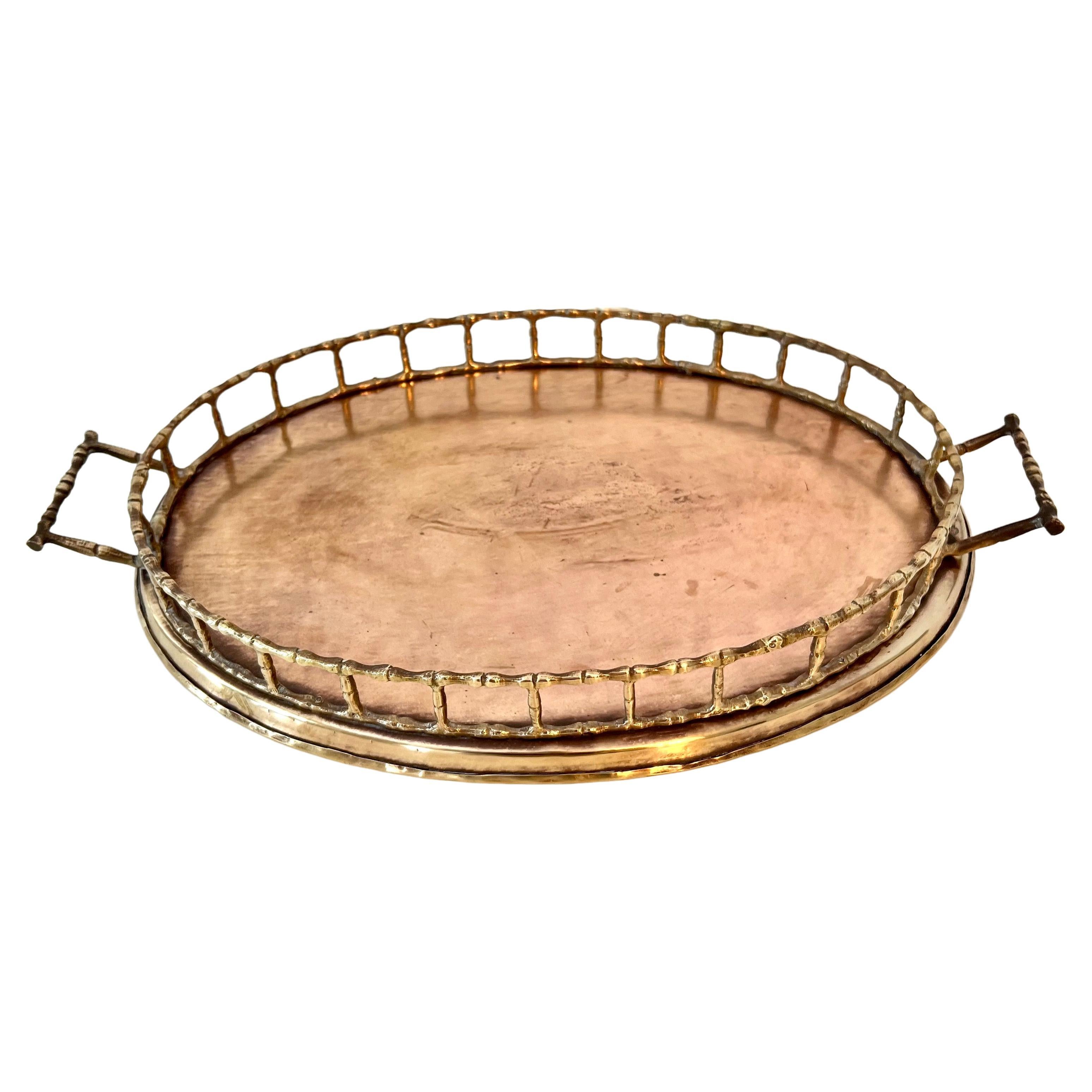 A wonderful round tray with handles in done in the shape of bamboo - a lovely addition to any table or side table as a center piece or serving tray. Also a compliment to any bar for serving cocktails and appetizers.

A nice decorative piece