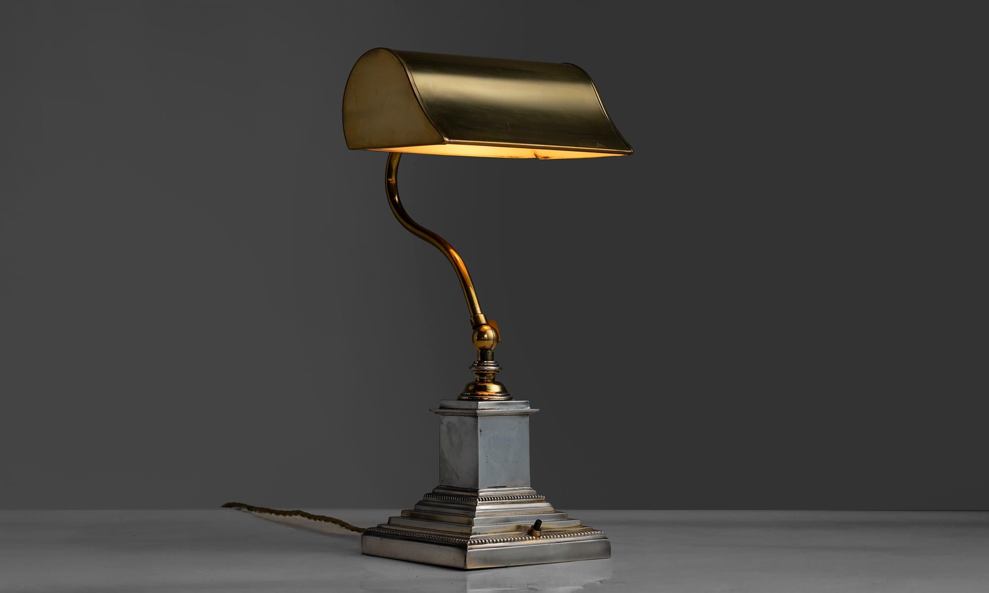 England, 1910
Bankers lamp with articulating neck and shade and beautifully detailed base.
8.25