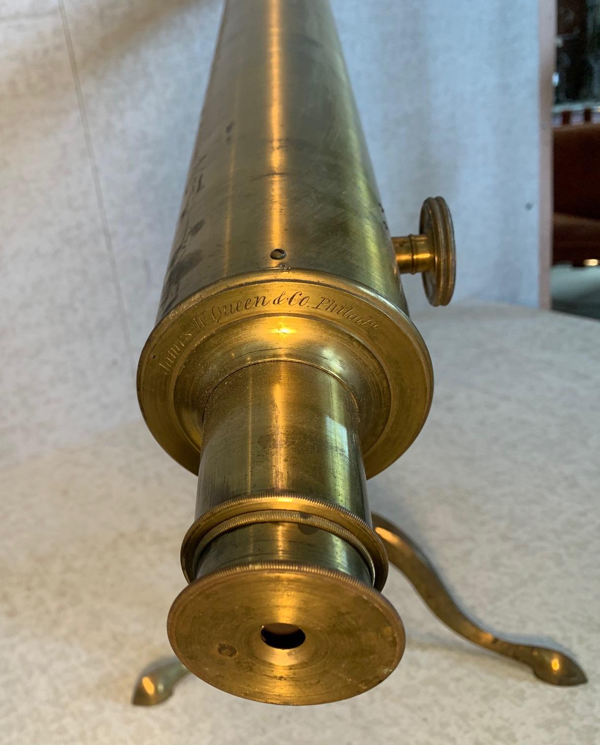 Table top, brass refracting telescope on folding cabriole leg base. Objective lens is 3 possibly 3.25