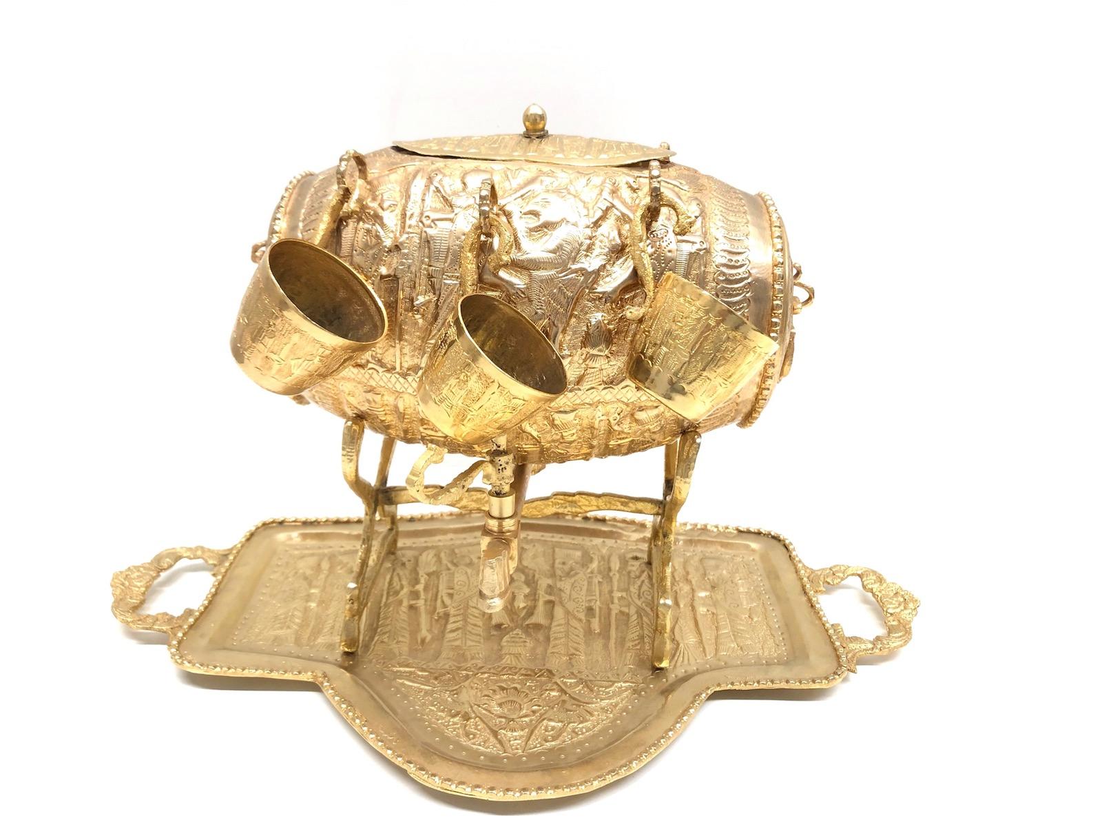 A beautiful vintage decorative drink cup set. This unique object, is made of handmade brass. A nice original vintage item for displaying or just to use. It is in the original as found condition, i think it was never used. It shows probably Persian