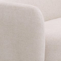 Canapé incurvé et arrondi en laiton et tissu beige