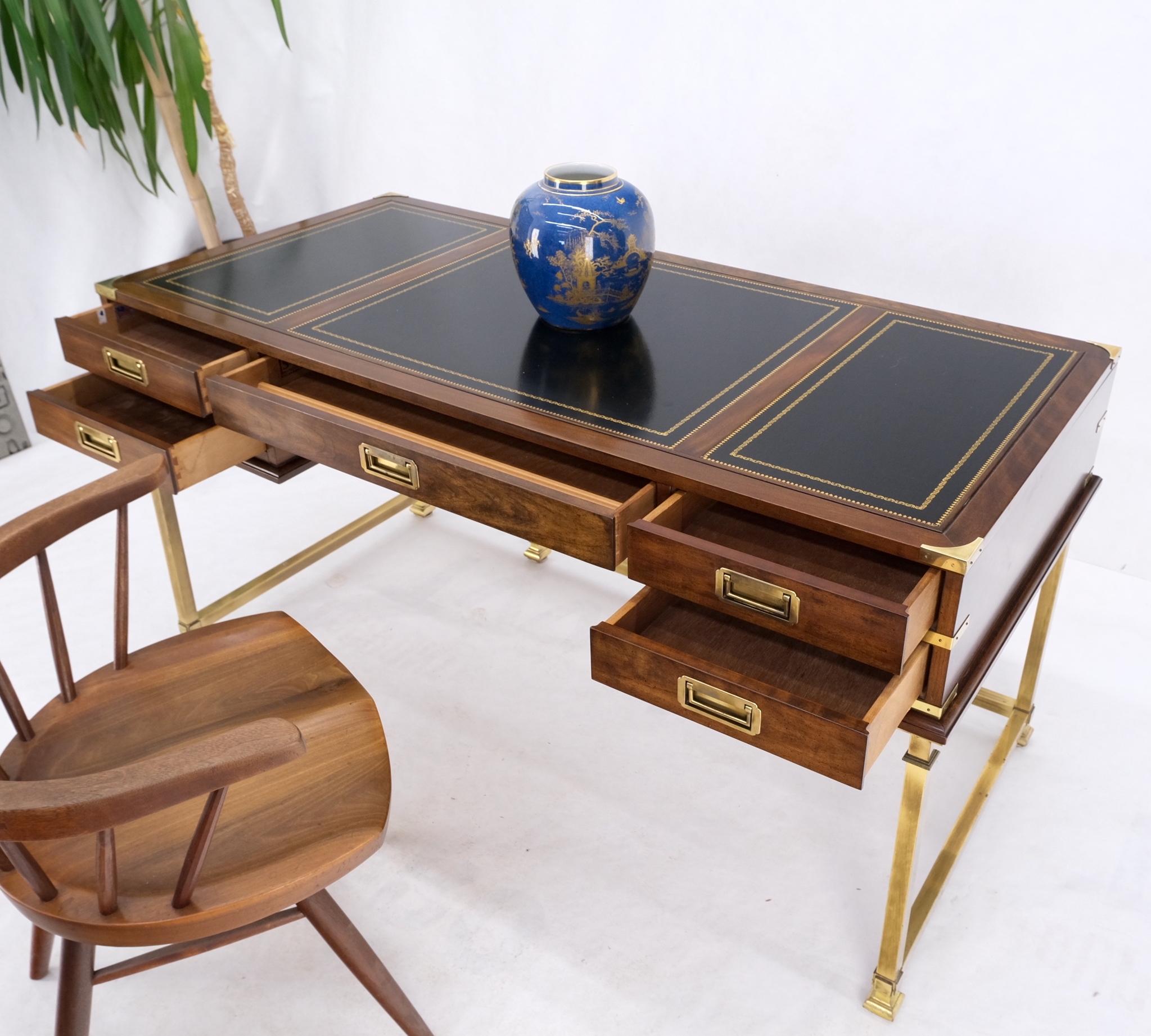 Brass base leather tooled top campaign style desk by Slight Mint.