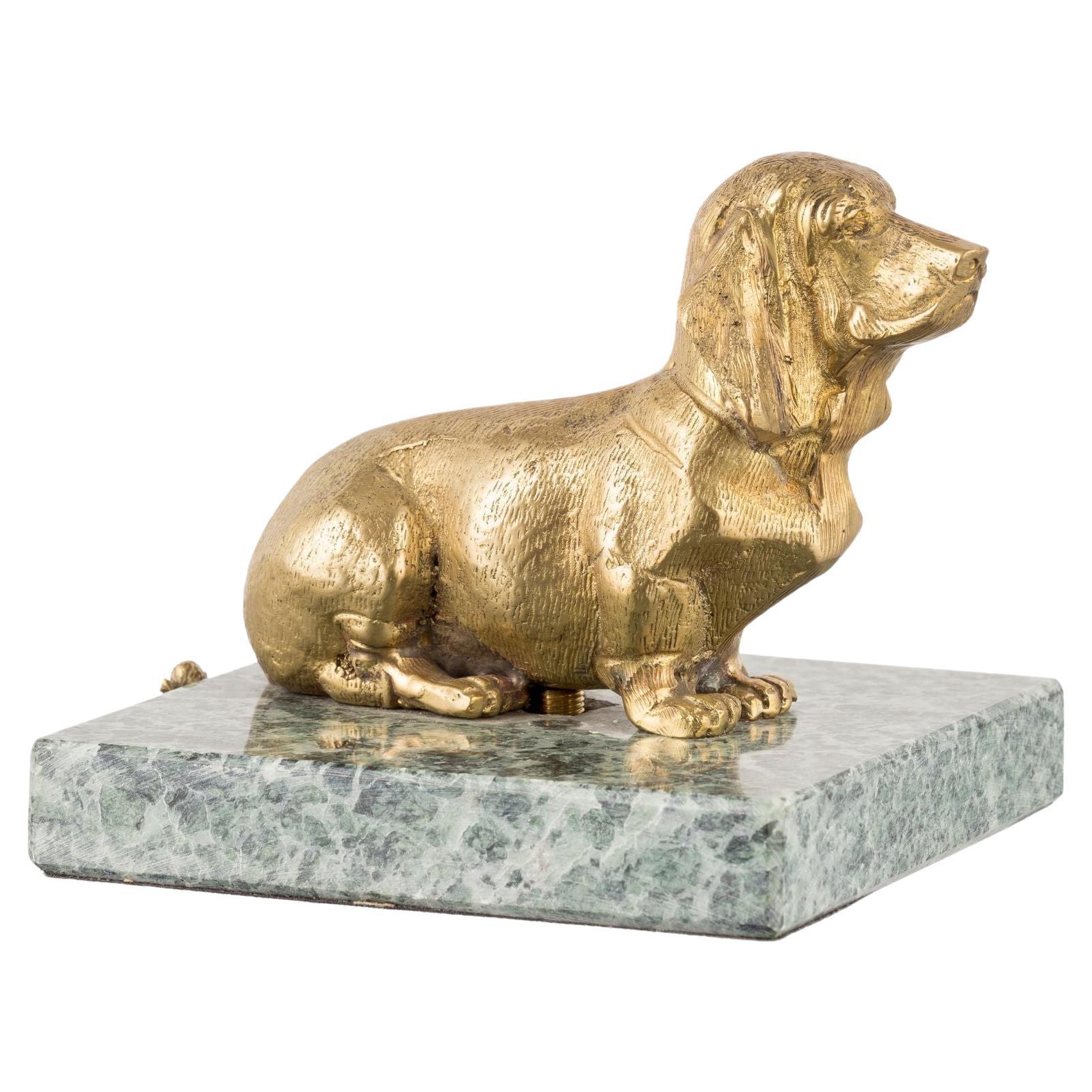 Nana brass basset with green marble base paperweight  For Sale