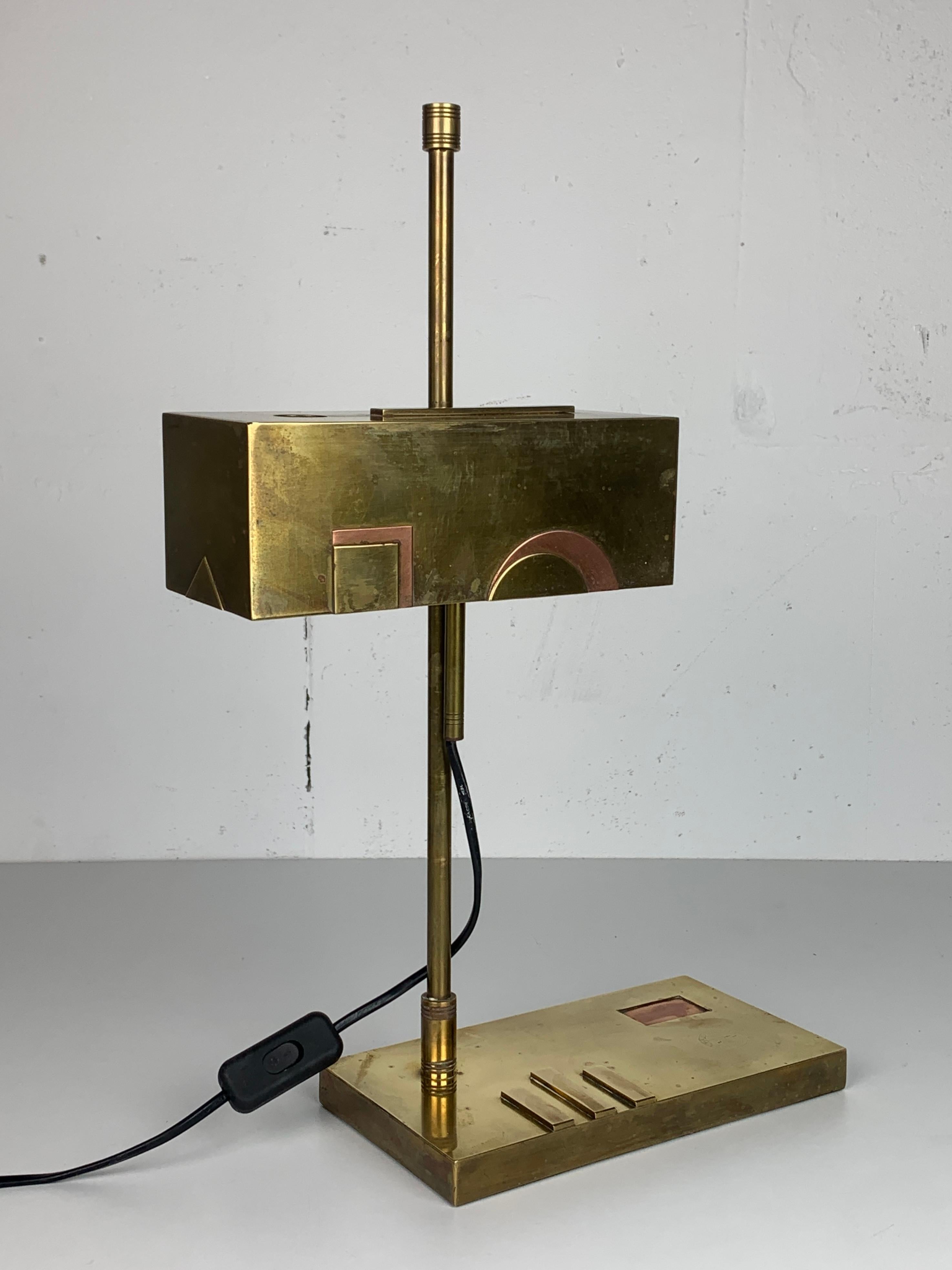 Gorgeous example of a Bauhaus desk lamp with the design attributed to Marcel Breuer. We have made the attribution to Breuer has we also have listed a larger version ( different models ) with practically all the same details as this one which is