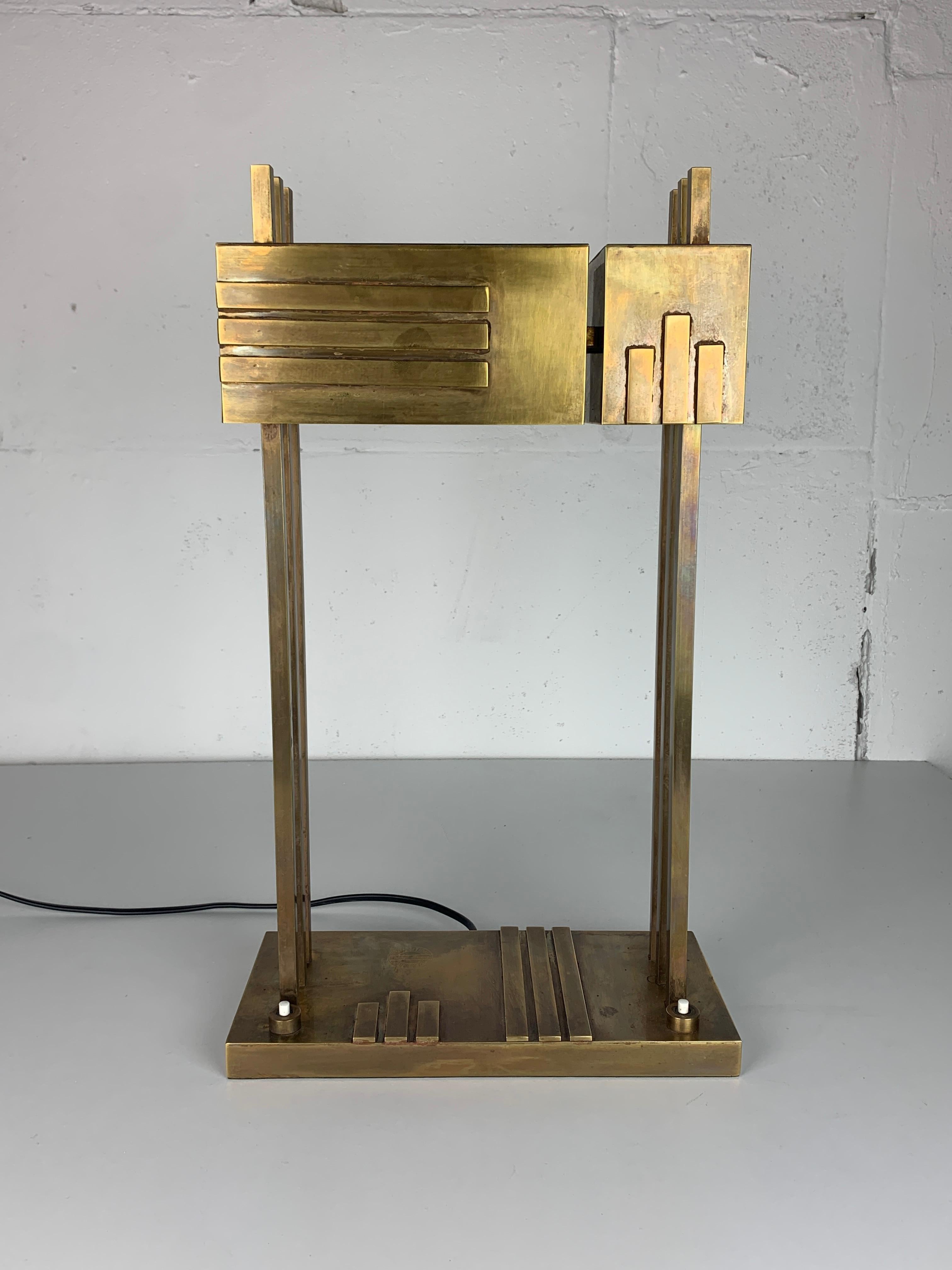 Wonderfull large brass desk lamp by Marcel Breuer for the 1925 Paris exposition, stamped and marked underneath the base. we believe this is to be a later edition ca 1980s. The lamp is fitted for a general E27 and and E14 lightbulb that can be