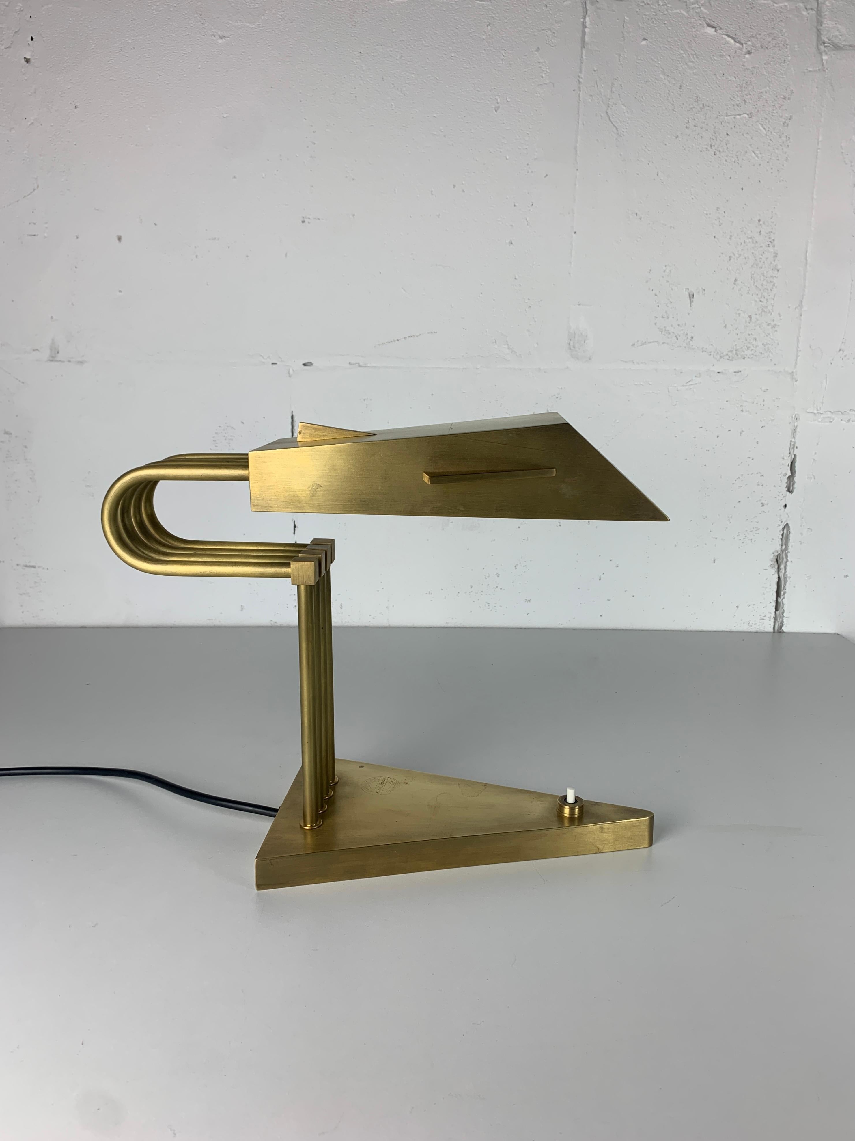 Wonderfull large brass desk lamp by Marcel Breuer for the 1925 Paris exposition, stamped. We believe this is to be a later edition ca 1980s. The lamp is fitted for a general E27. The brass as can be seen is in a patinated and vintage condition. The