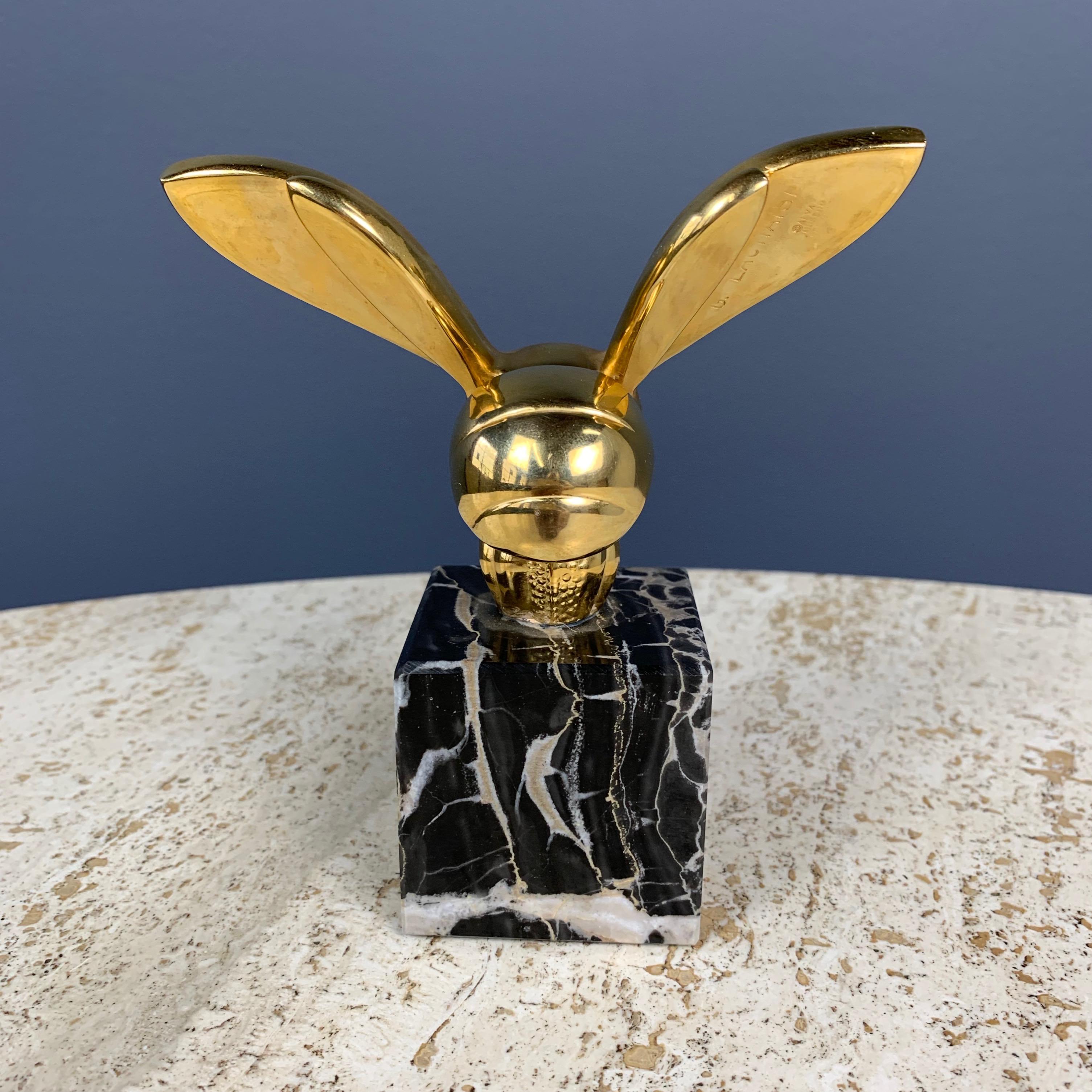 This sculpture of a Bee in brass on a marble base is an authorized museum replica by Alva Studios and was produced in the late 1970s. The original by Gaston Lachaise is in the Philadelphia. Museum of Art.