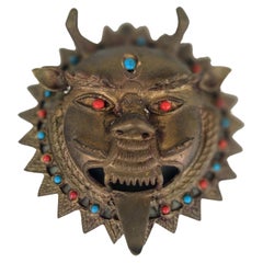 Máscara de latón enjoyada de la India