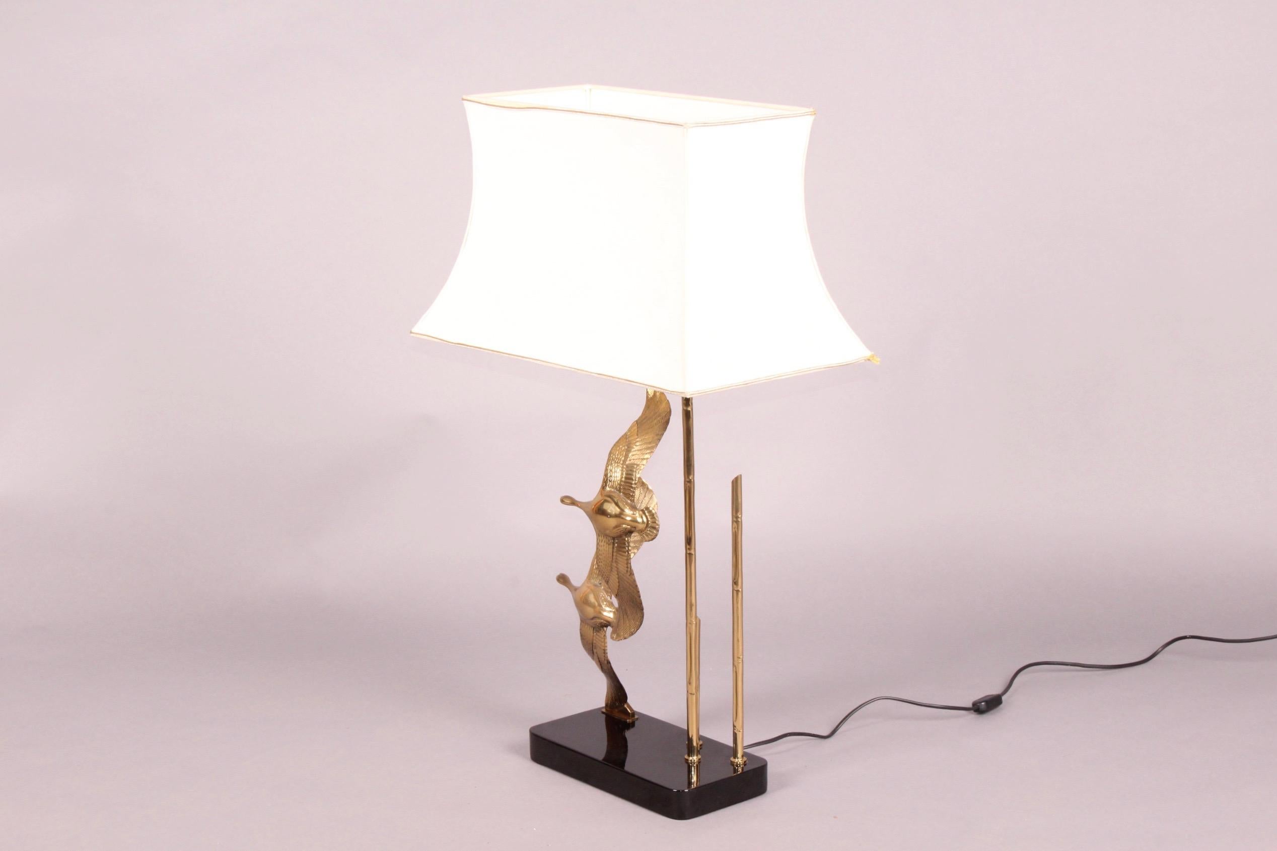 Brass bird table lamp, dimensions with out shade H 64 by 30 by 15 cm.