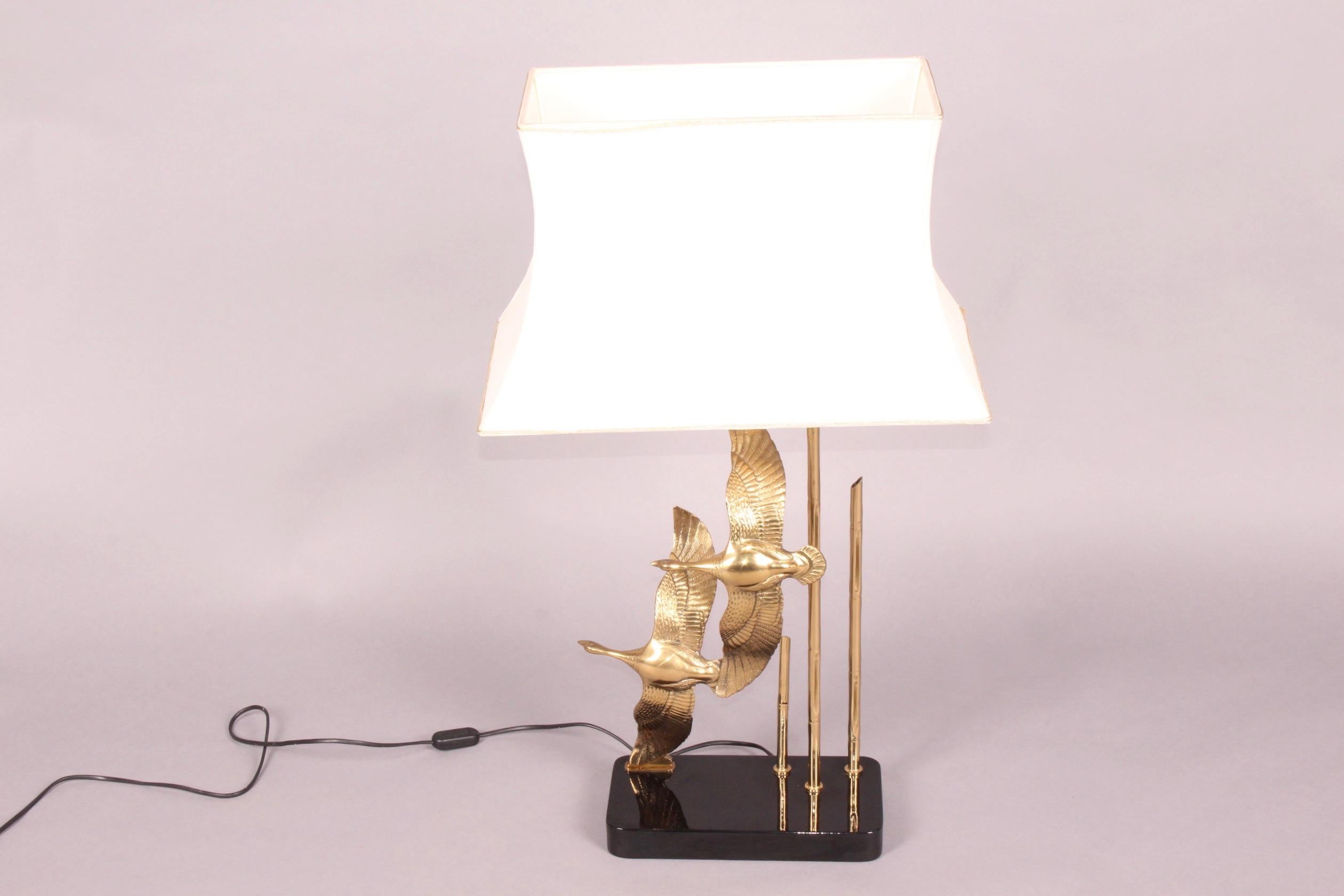 brass bird lamp