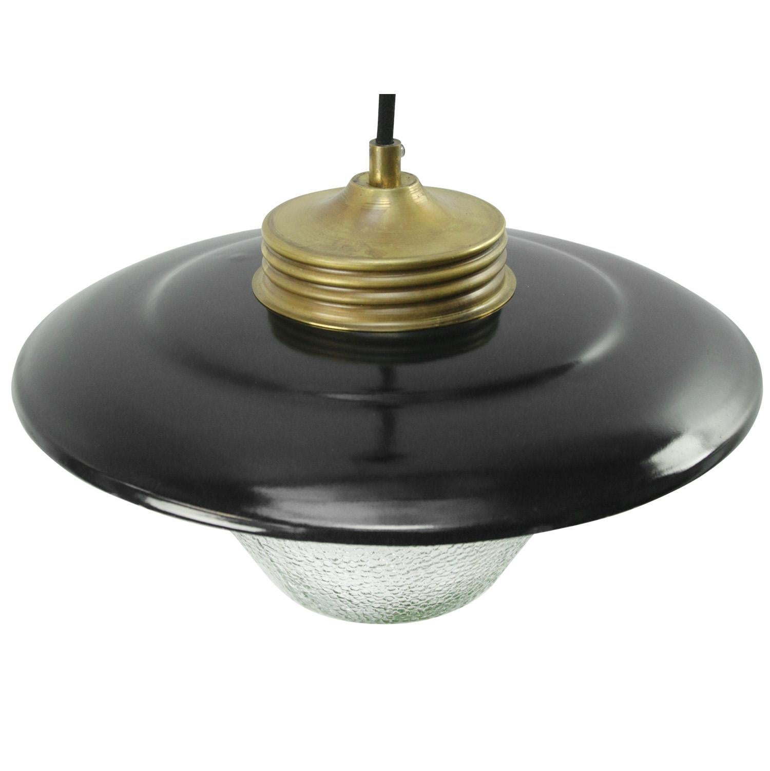 Black enamel Industrial hanging lamp.
Frosted glass with brass top.

Weight: 2.40 kg / 5.3 lb

Priced per individual item. All lamps have been made suitable by international standards for incandescent light bulbs, energy-efficient and LED