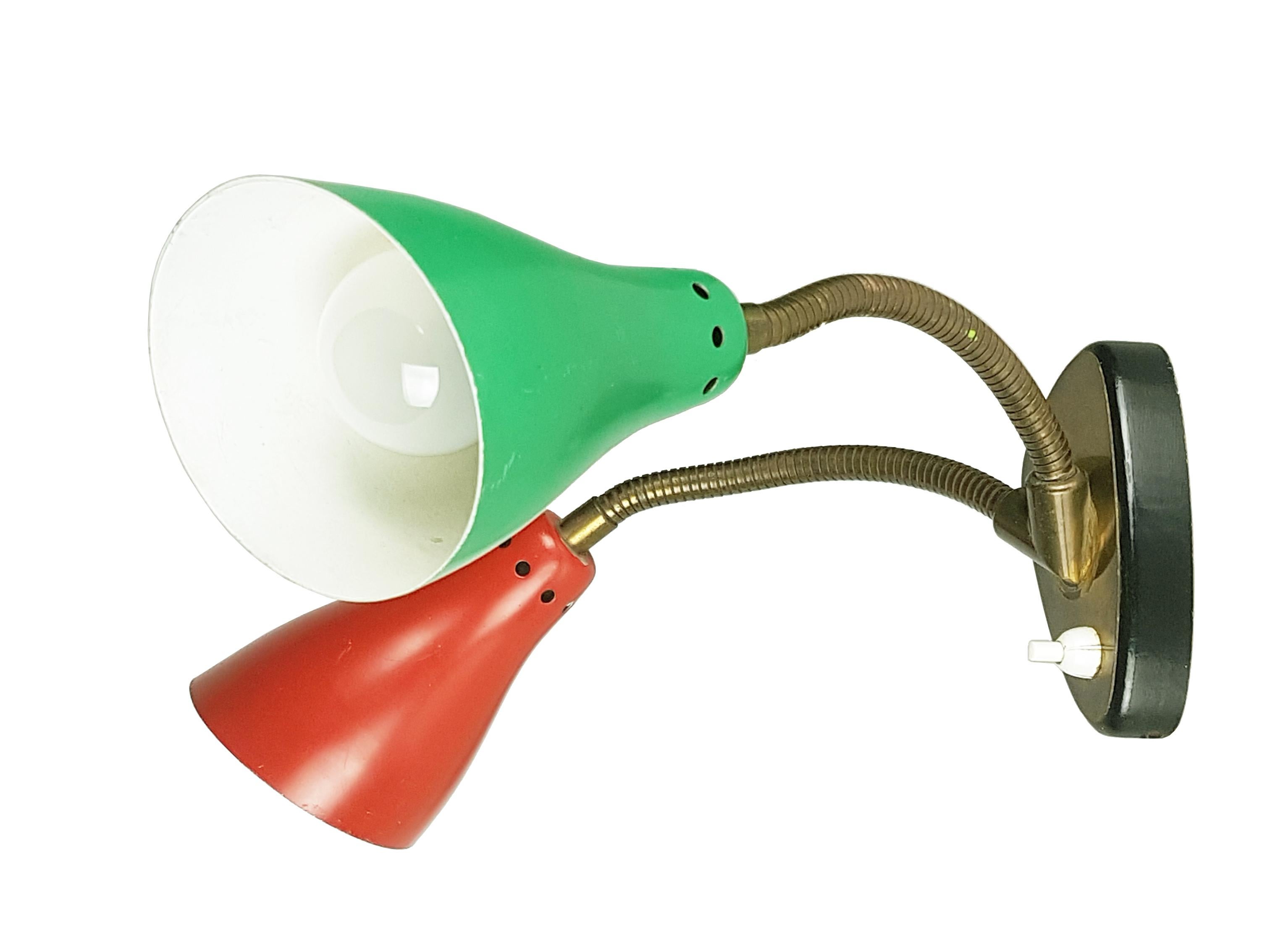 Beautiful wall lamp with 2 adjustable shades. Black wood and brass structure with flexible red and green shades. the lamp is equipped with an internal switch.