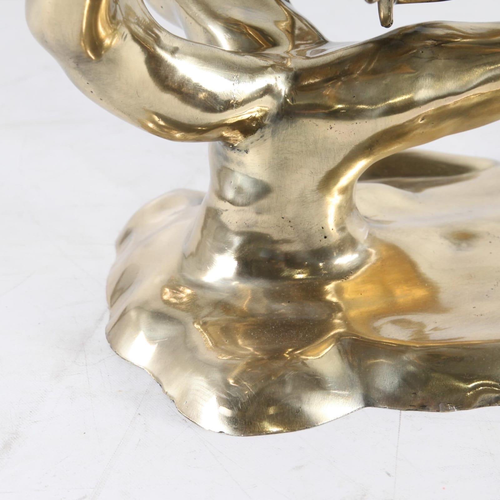 Rare polished brass « bonsaï » coffee table attributed to Willy Daro.
Very decorative, great quality. Excellent condition.