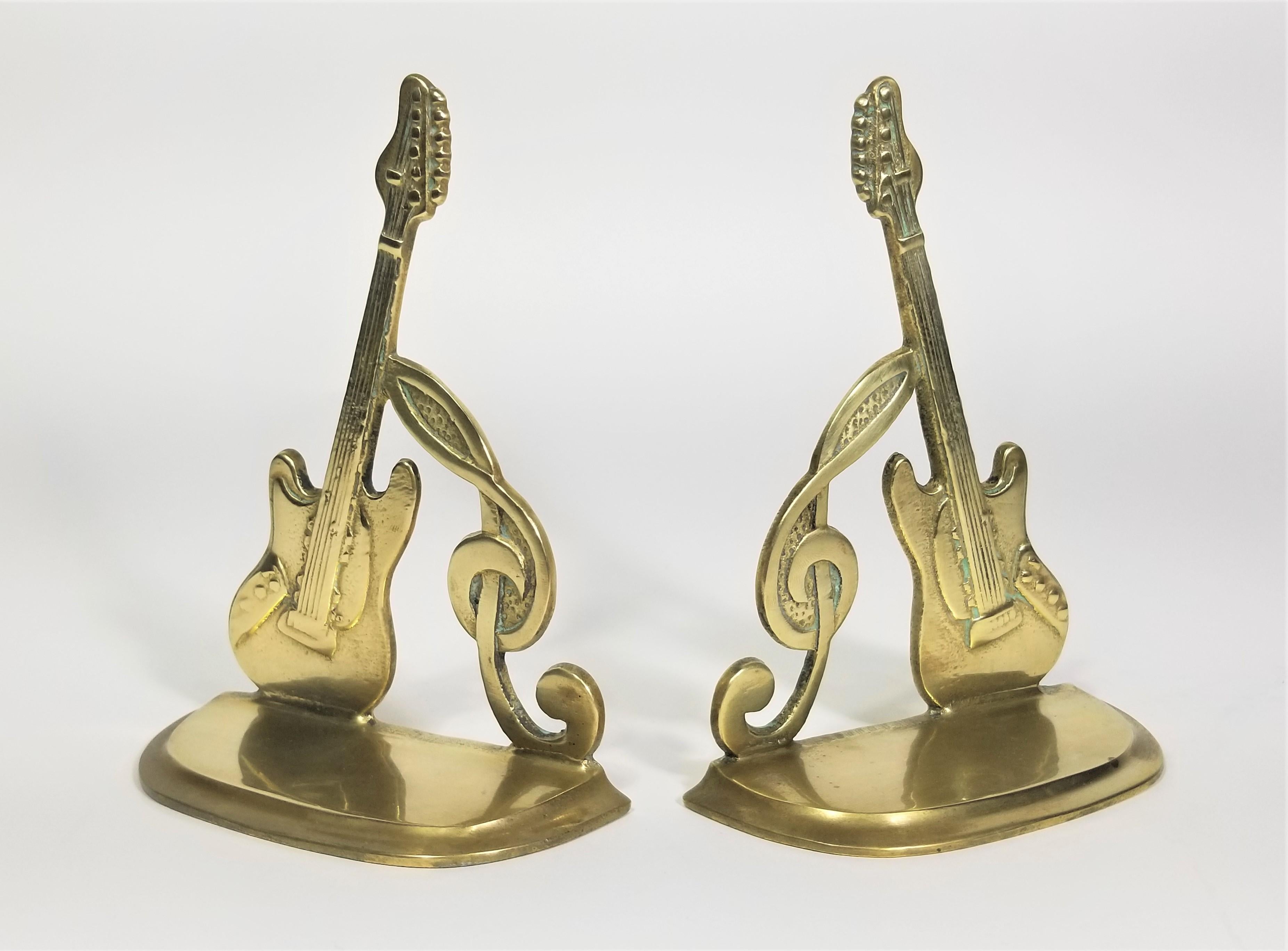 20th Century Brass Bookends Guitar and Music Note, Dated 1987