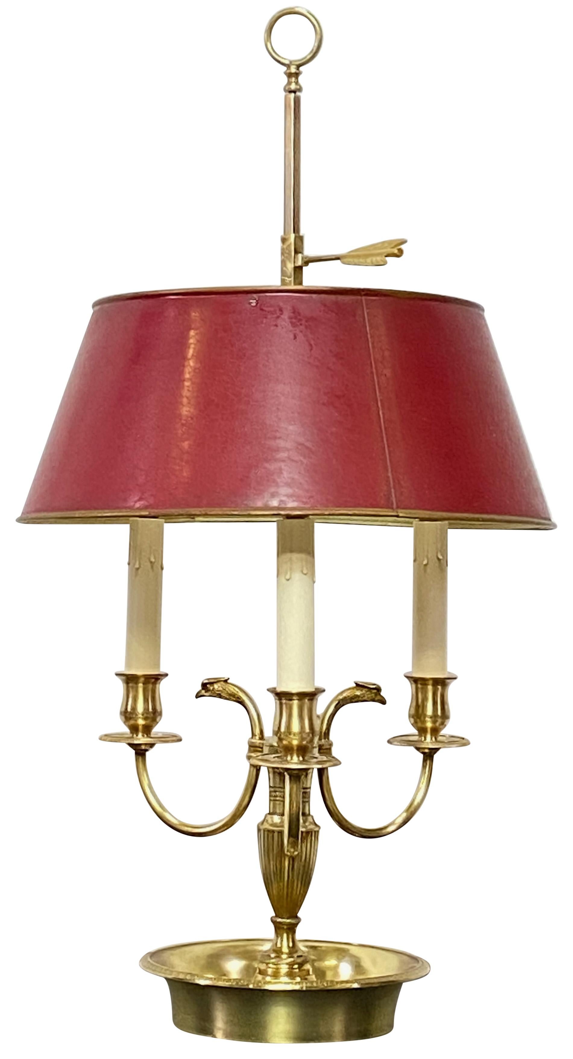 An excellent quality early 19th century French style (produced in the early 20th century) brass bouillotte table lamp with original red tole painted shade.
Recently reconditioned and re-wired in excellent condition.
We can change the white candle
