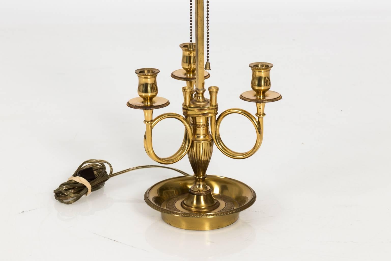French brass boulette lamp with three lights, circa mid-20th century. Shade not included.
 