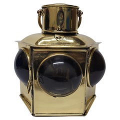 Antique Brass Bow Lantern with Bullseye Lenses