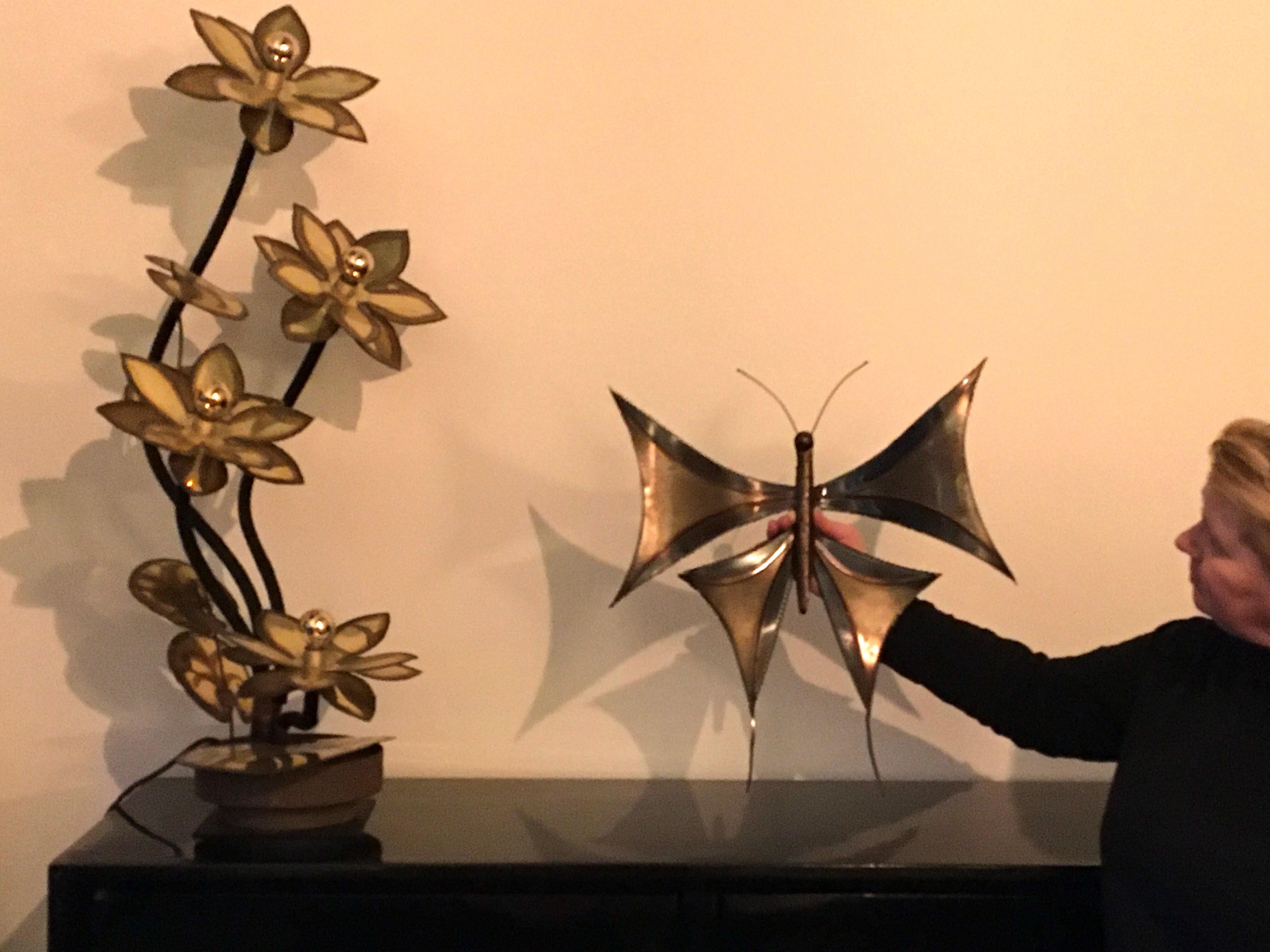 Brass butterfly wall sculpture. 
This butterfly wall decoration is handmade and signed by the artist: GILL'S.
A brutalist wall sculpture - brutalist animal sculpture of a butterfly or papillon. 
The edges are jagged. 
Can hang on the wall by a