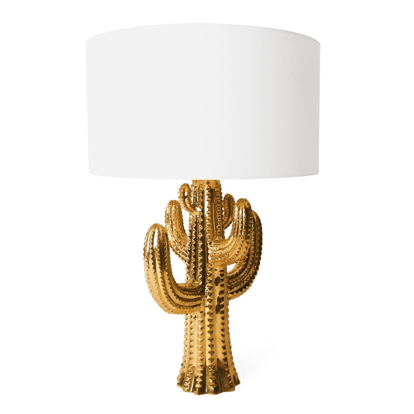 Desert Glow. Hand-cast in solid brass from a clay model sculpted by Jonathan and his team in our Soho studio, our Brass Cactus Lamp is a pared down homage to the majestic Saguaro cactus topped with a silky white shade. Bring a touch of Southwest