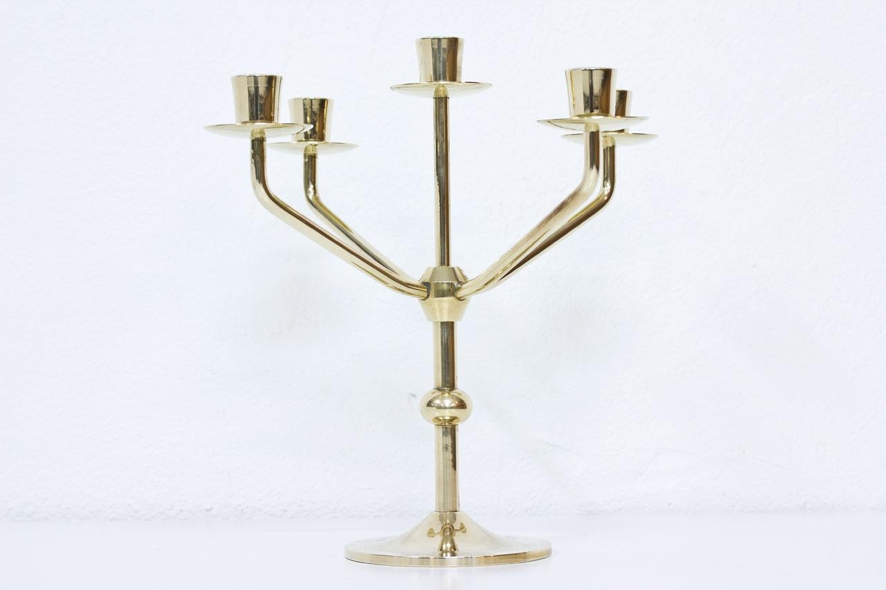 Solid polished brass candelabra. Manufactured by Kee Mora in Sweden during the 1950s.
Suitable for large candles (2cm diameter).