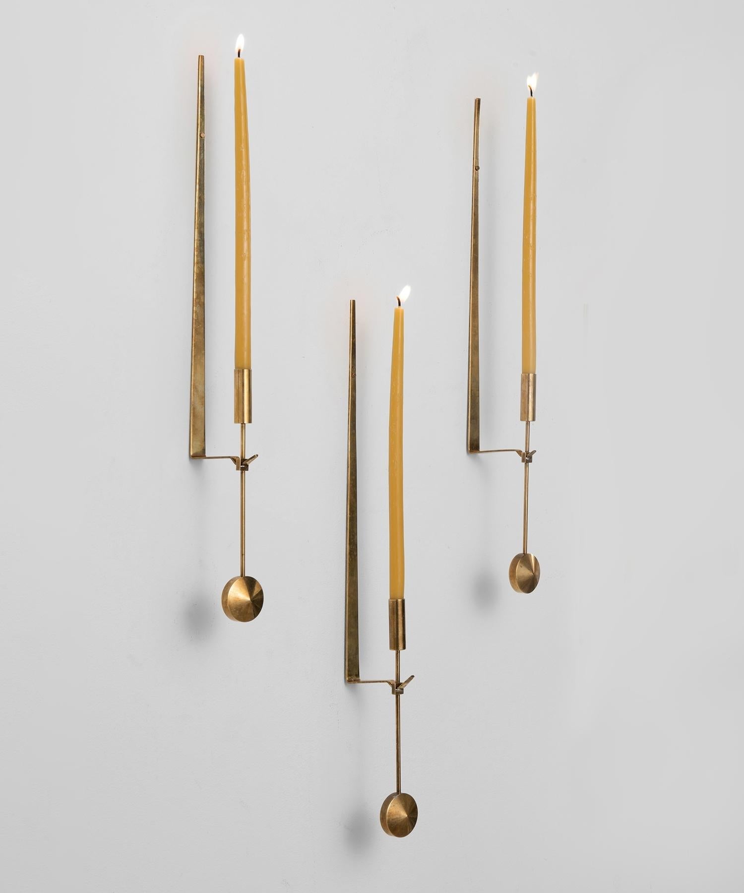 Brass candleholder by Pierre Forsell, Sweden, circa 1970.

Unique wall-mounted brass candleholder, produced by Skultuna.