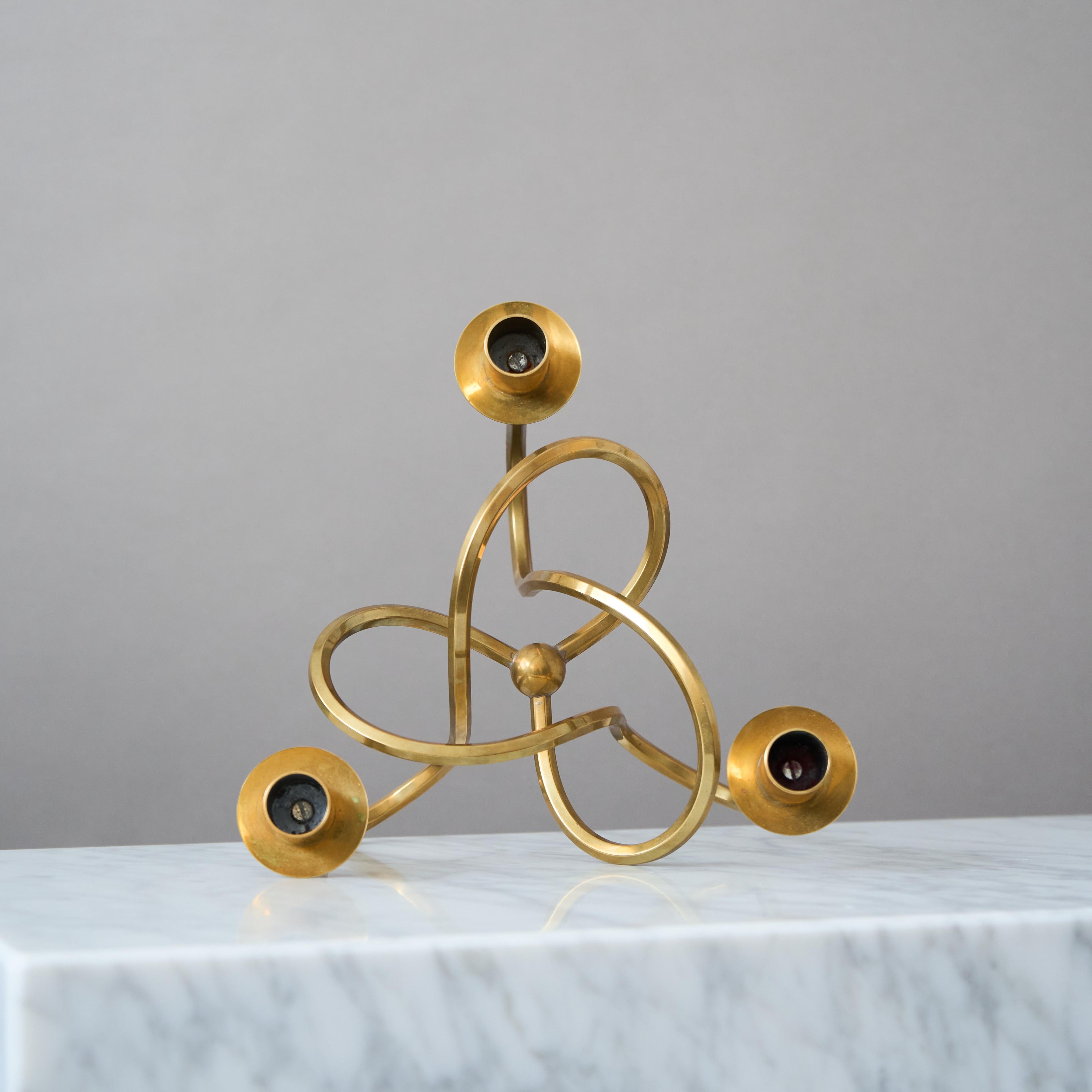 A beautiful brass candle holder with amazing patina. 
Designed by Josef Frank in 1938 and made by Firma Svenskt Tenn, Stockholm, Sweden. 

Excellent condition.

Architect and designer Josef Frank left Austria in 1933 due to growing anti-Semitism and