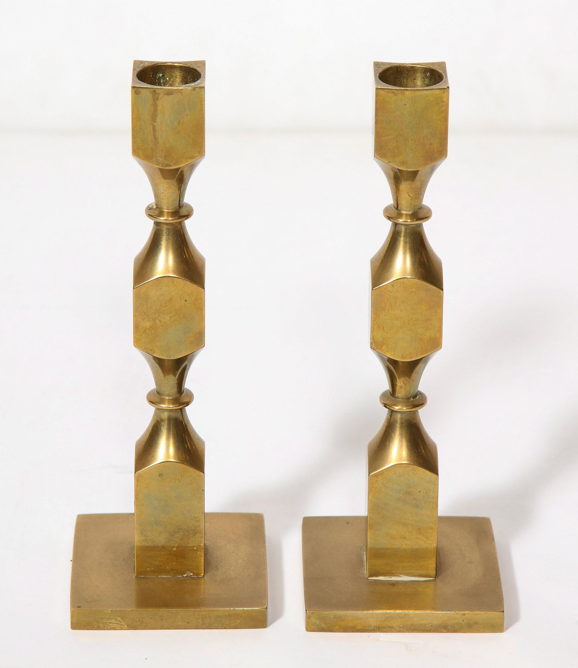 Pair of Swedish brass candlesticks by Lars Bergsten for Gusum

Signed and dated 1983.