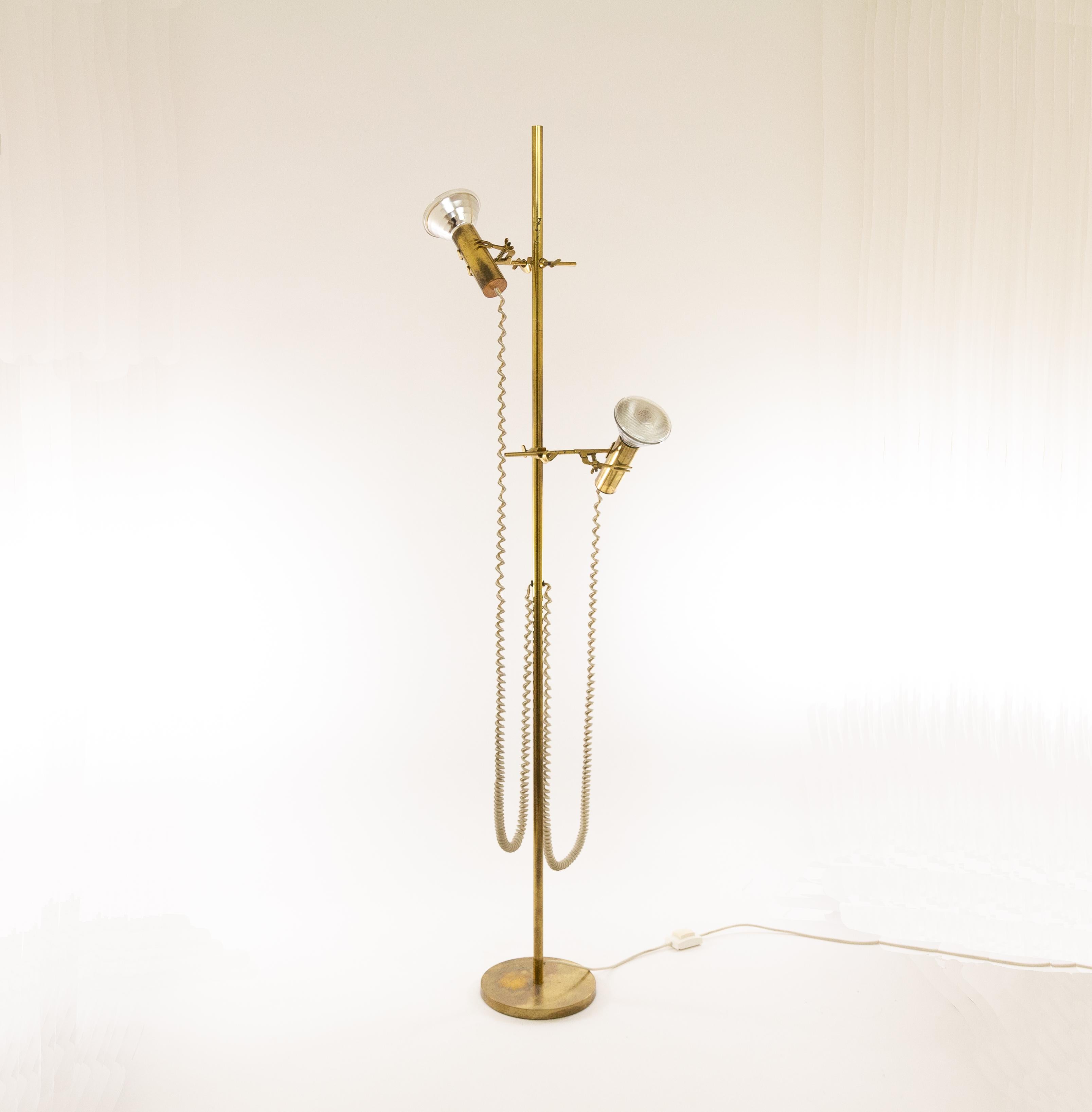 Very rare floor lamp Capacio designed by Fulvio Ferrari for his own company Solka B. Capacio was produced in two versions: vitrified brass and chromed steel. This piece is in vitrified brass.

Capacio was the second lamp Fulvio Ferrari ever