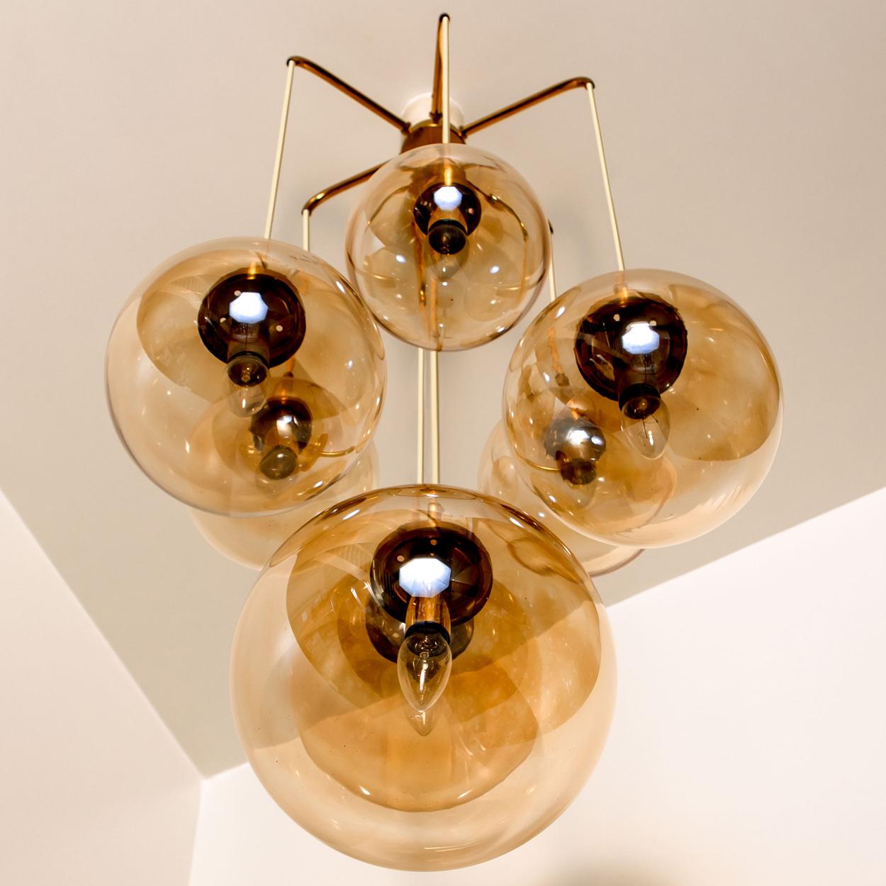 Mid-Century Modern Brass Cascade with Seven Hand Blown Globes by Glashütte Limburg For Sale