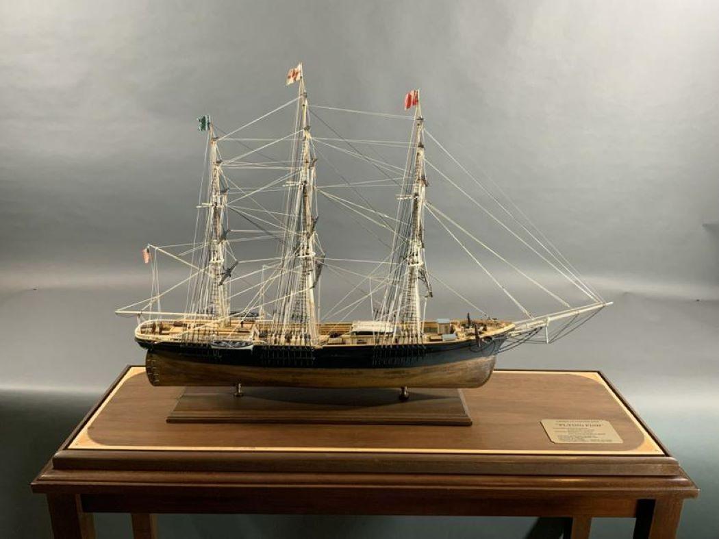 Cased ship model of the Boston built clipper ship flying fish with copper sheathed hull, planked deck, full rigging anchors, barrels, cabins, lifeboats, etc. Fitted to an inlaid display case. Case dimensions: 44