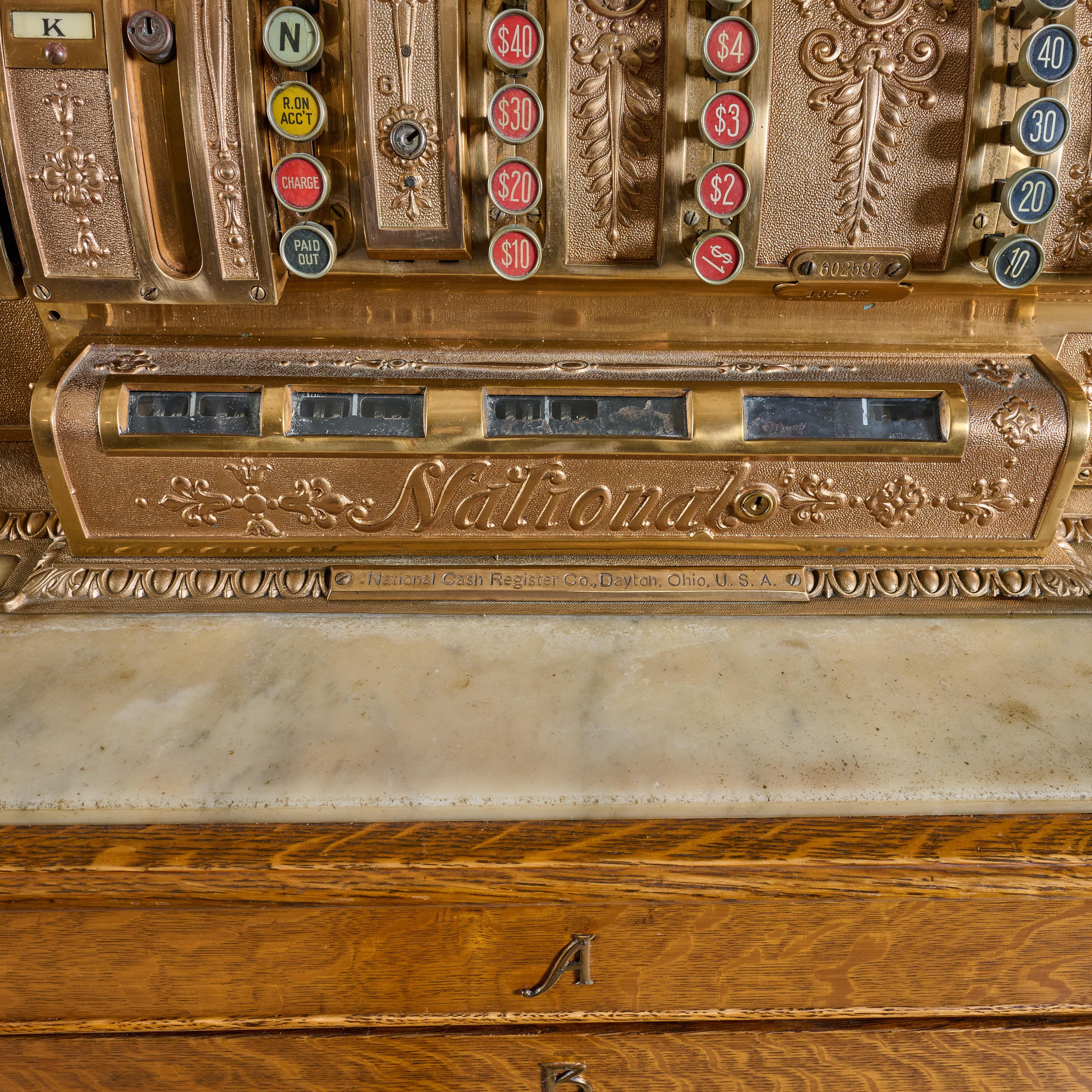 antique brass cash register